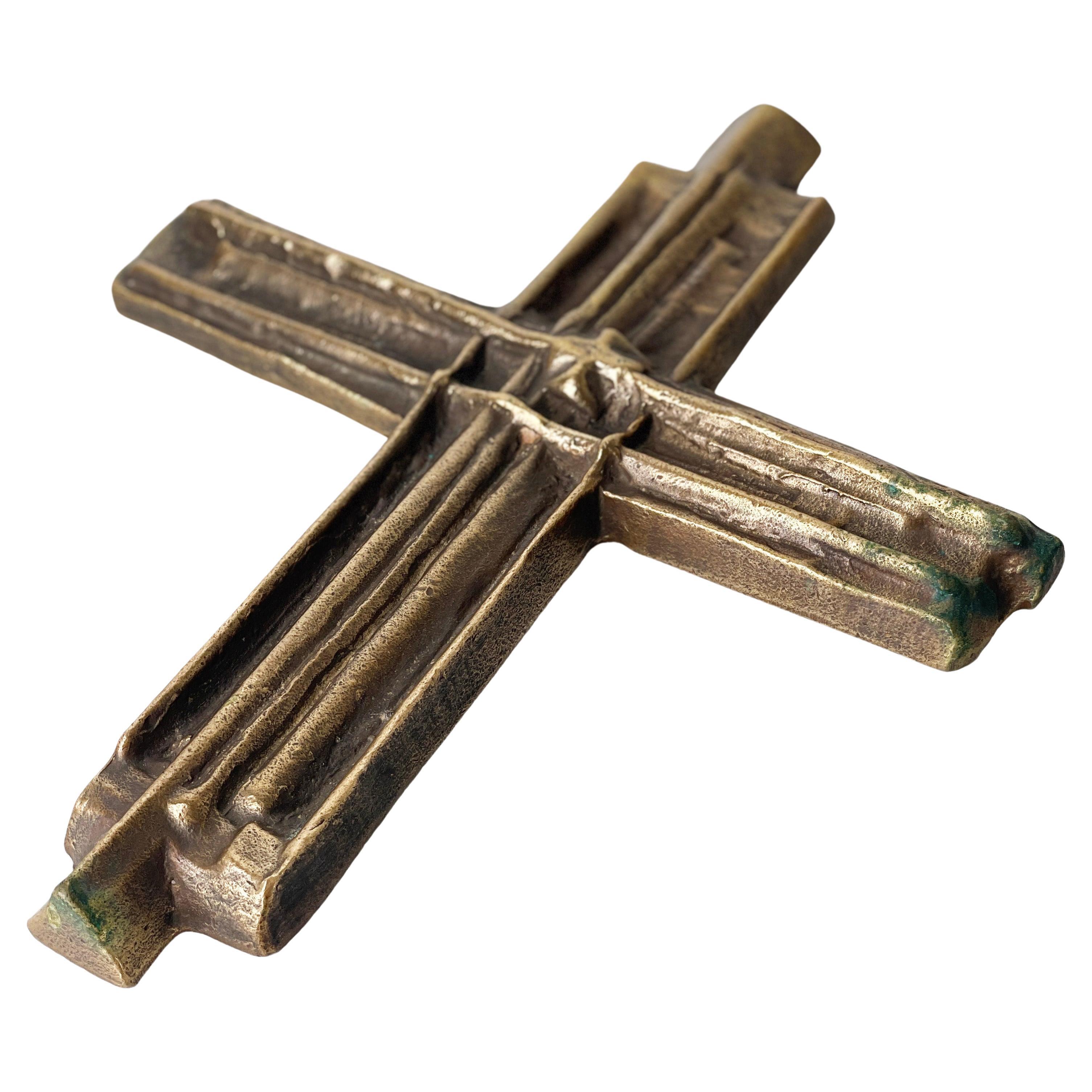 Mid Century solid brass Brutalist crucifix. With very slight oxidization at base, although this is barely visible. Ring at rear for wall hanging.