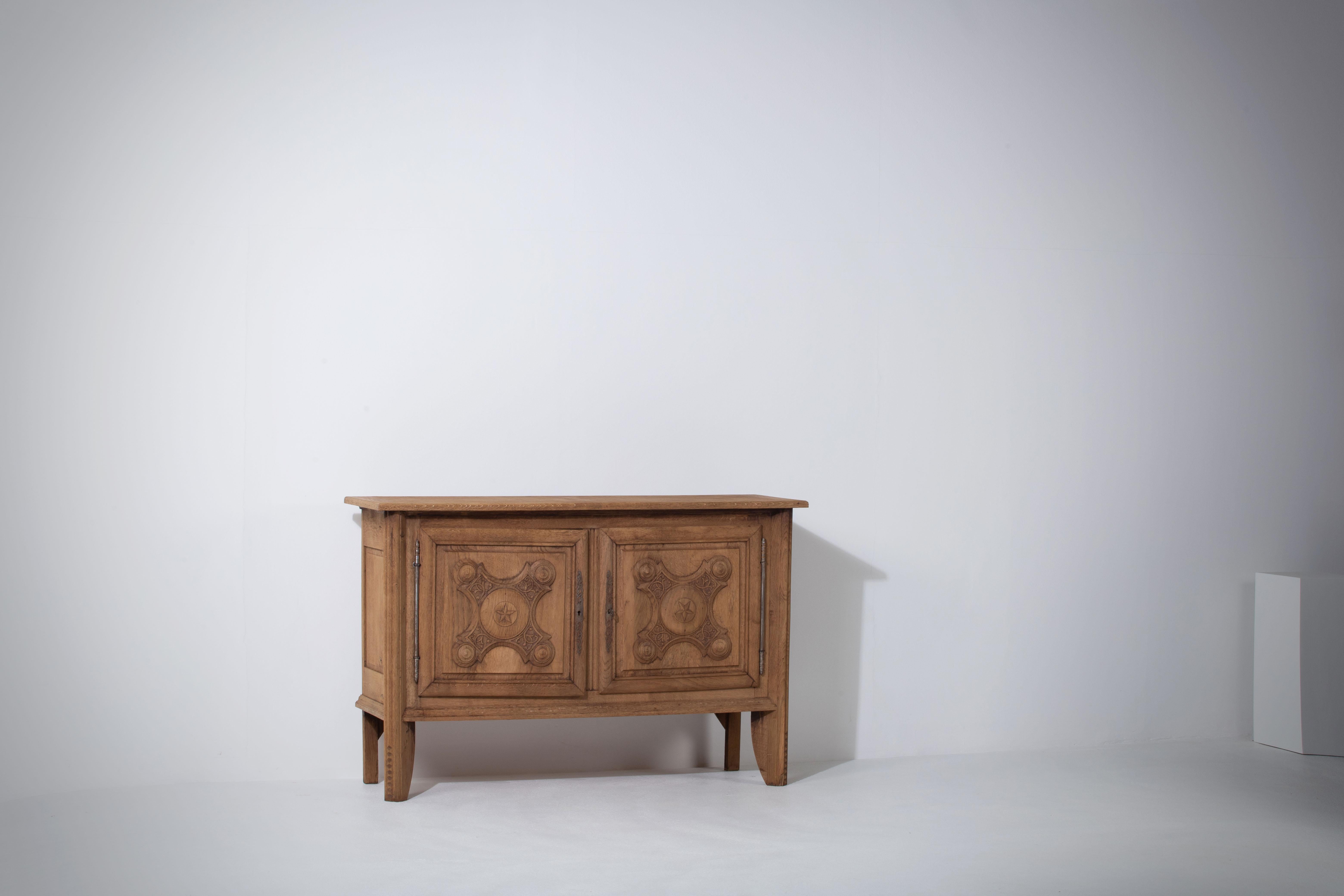A matching sideboard is available.
Brutalist solid elm credenza.
The buffet features stunning oak structure on door panels. It offers ample storage, with shelve behind the doors. 
A unique blend of Art Deco Spanish and Brutalist Modern design. The