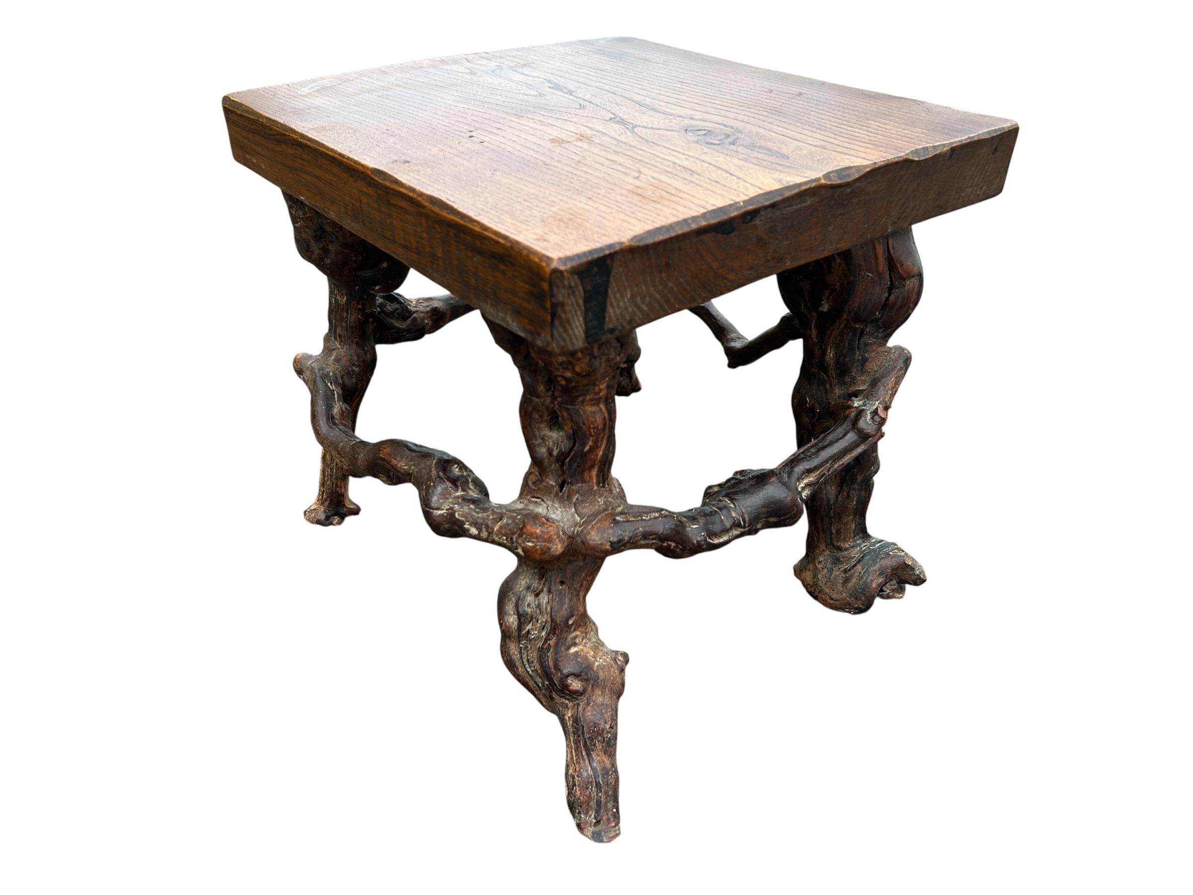 Brutalist brutalist solid wood and vine base table For Sale