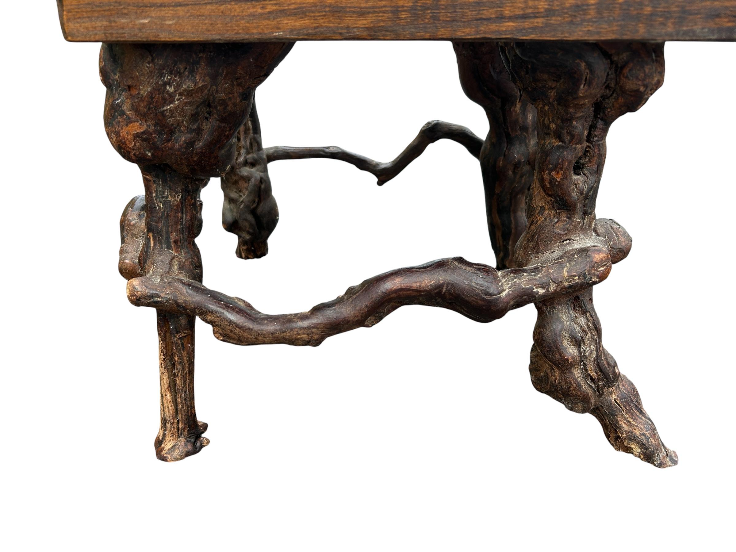 brutalist solid wood and vine base table In Good Condition For Sale In Brooklyn, NY