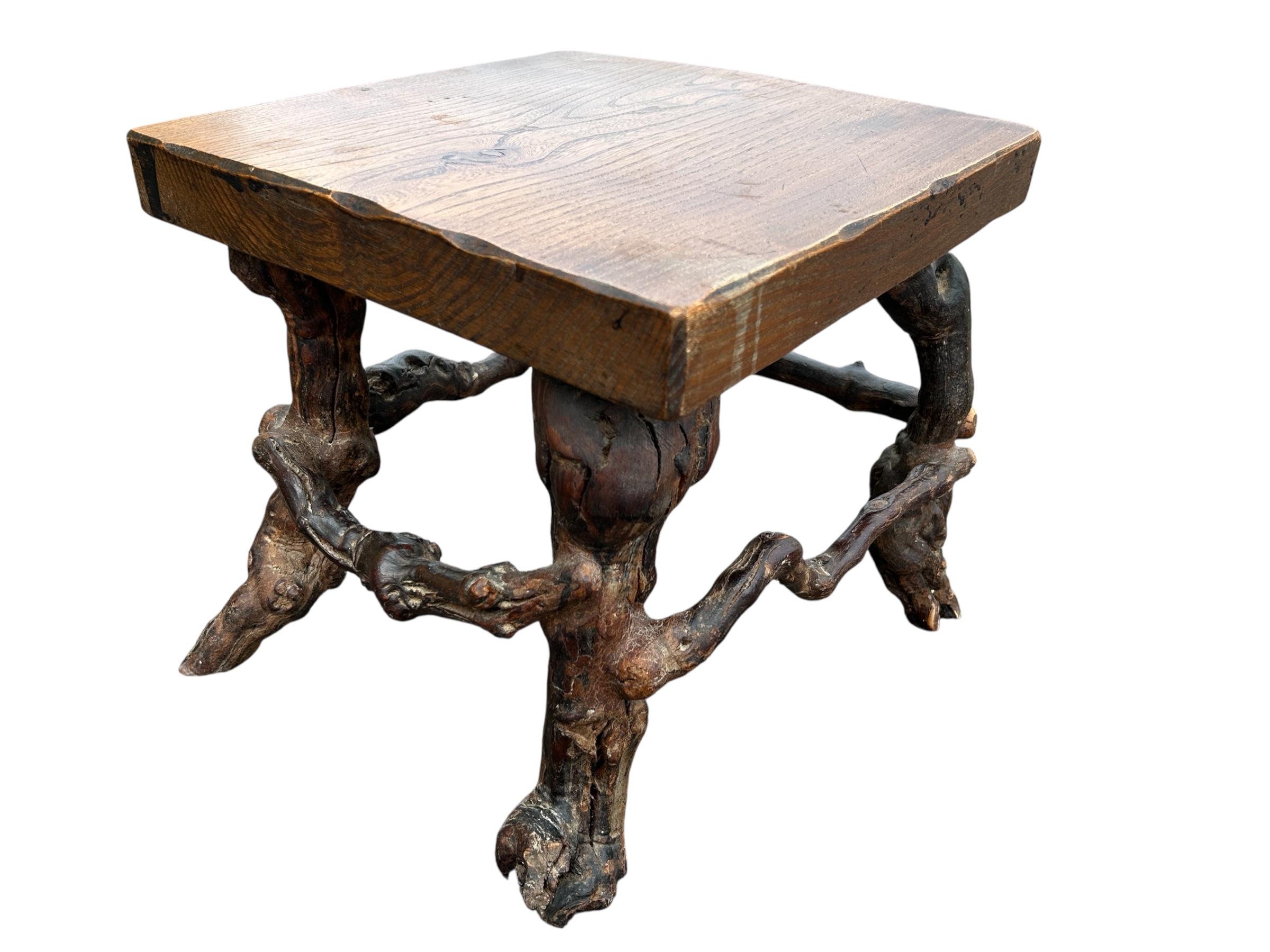 Wood brutalist solid wood and vine base table For Sale