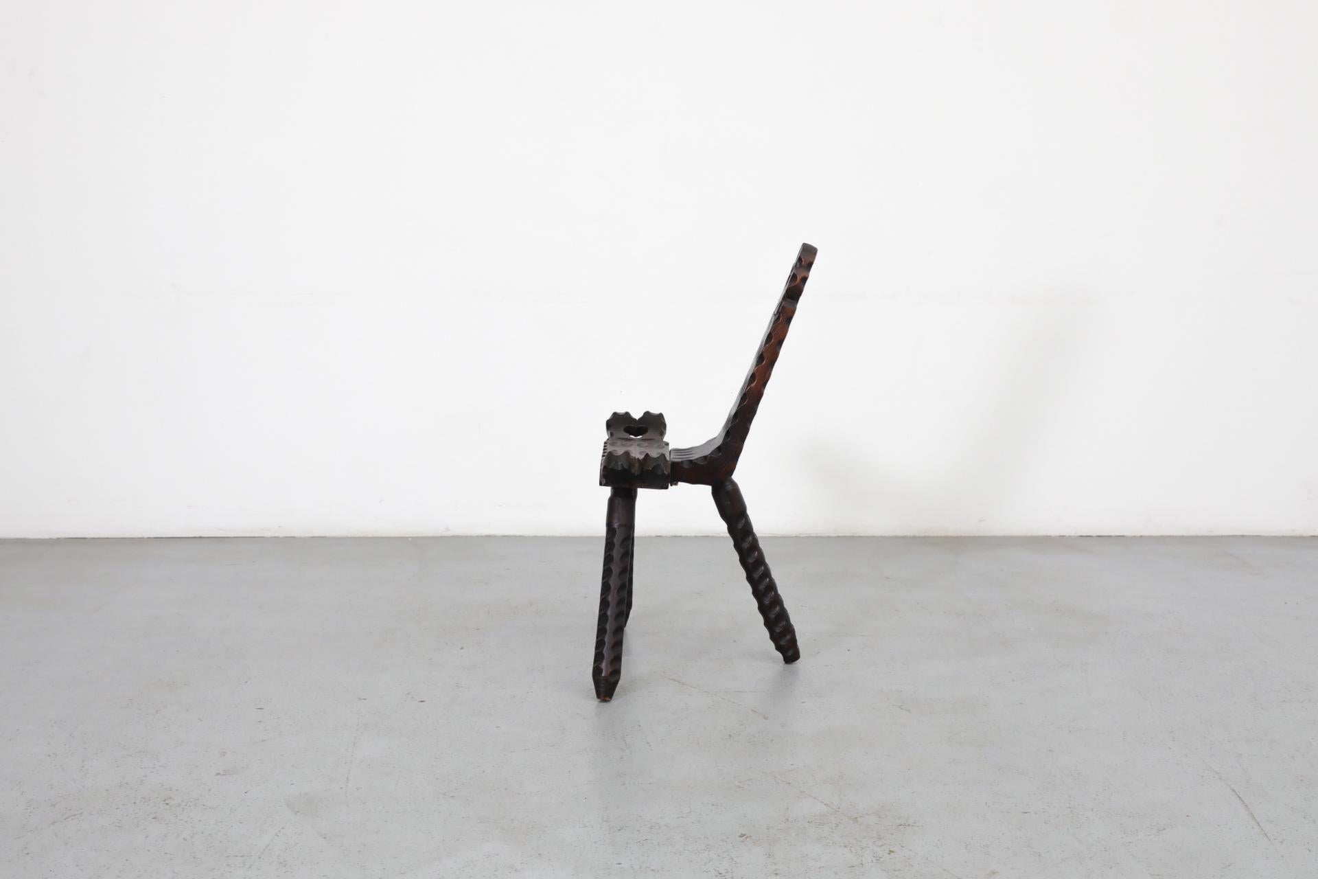 Brutalist Spanish Fireside Chair with Tripod Legs and Decorative Carving In Good Condition In Los Angeles, CA