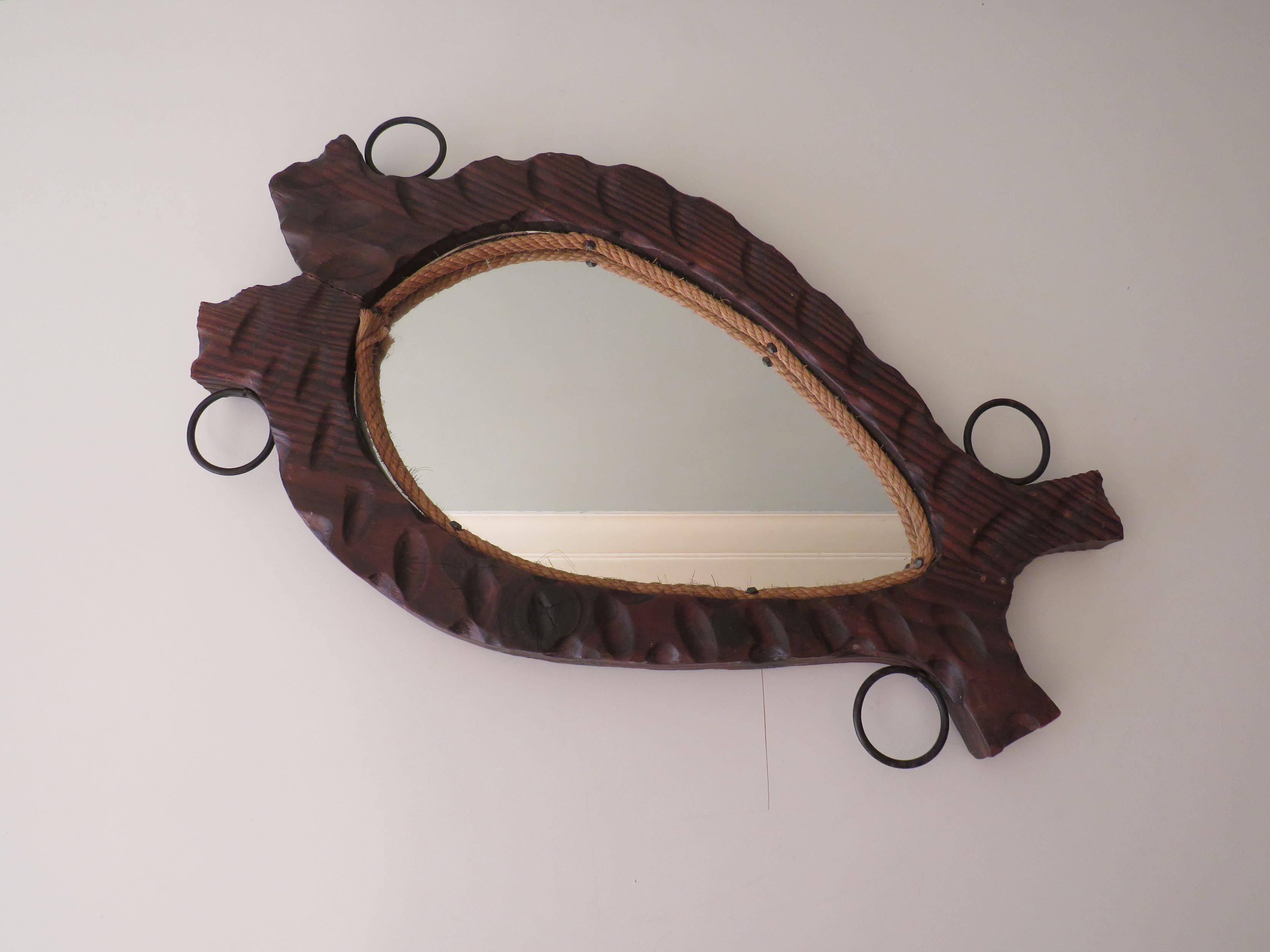 Hand-Carved Brutalist Spanish mirror with dark wood frame, 1960s For Sale