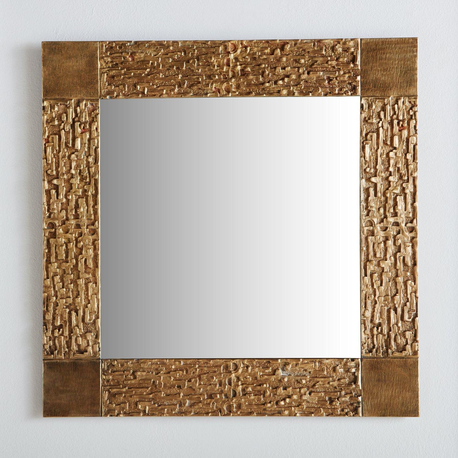 A brutalist square wall mirror attributed to Luciano Frigerio. This mirror features a patinated cast brass frame with a captivating textural finish and square corner details. Sourced in France, 1970s.

Luciano Frigerio (1928-1999) was an Italian