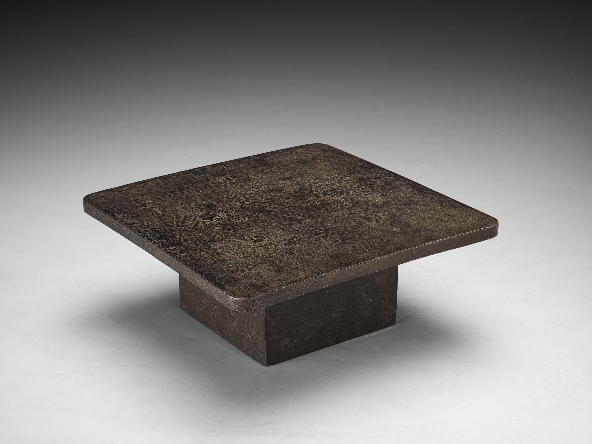 Cocktail or coffee table, resin, Europe, 1970s.

A brutalist square coffee table in resin made in the 1970s in Europe. This particular table has a very interesting partly matte finish in a stone look that has great detailing and a rich dark grey and