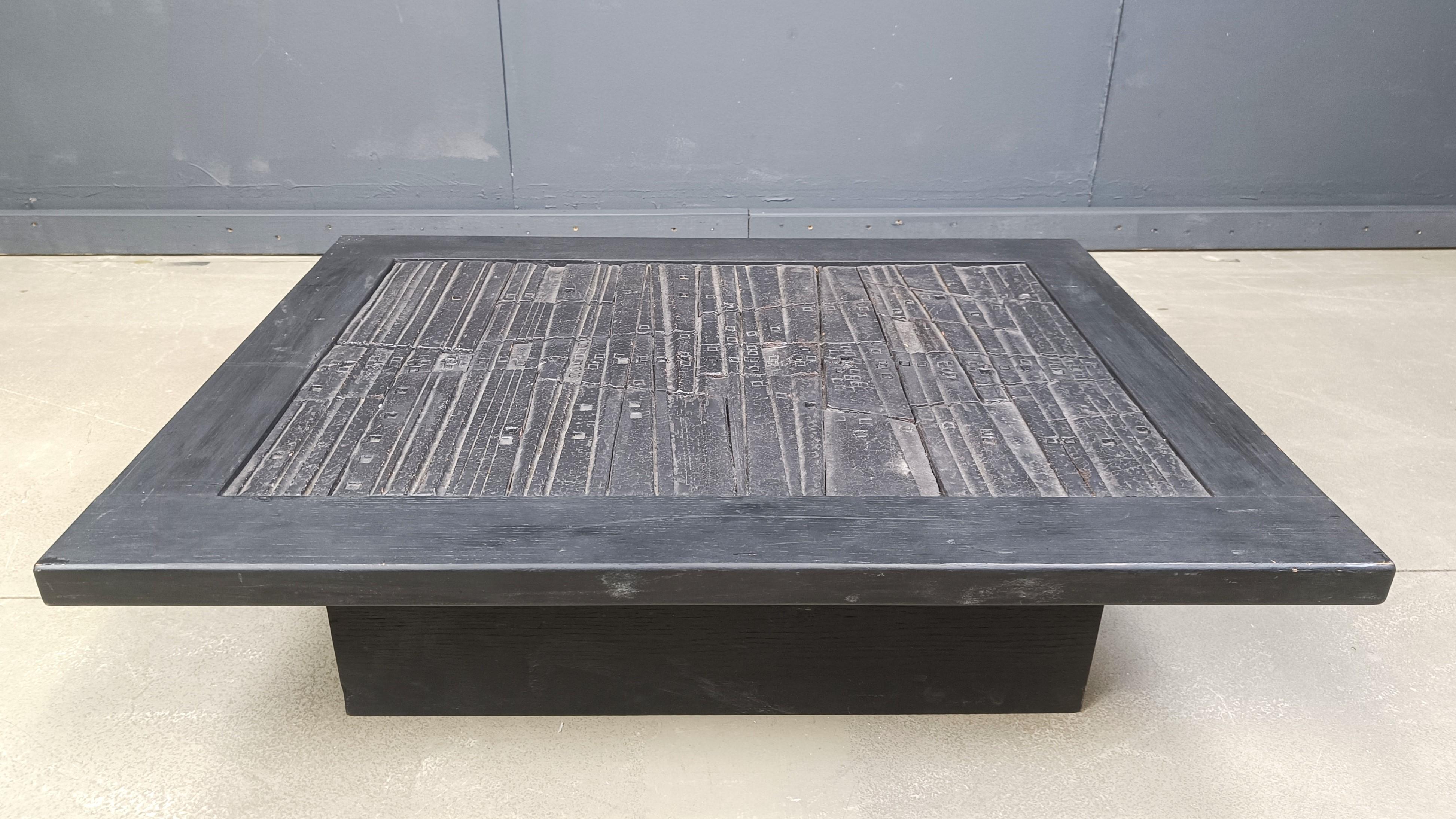 Ebonized Brutalist stone coffee table, Made In belgium, 1960s For Sale