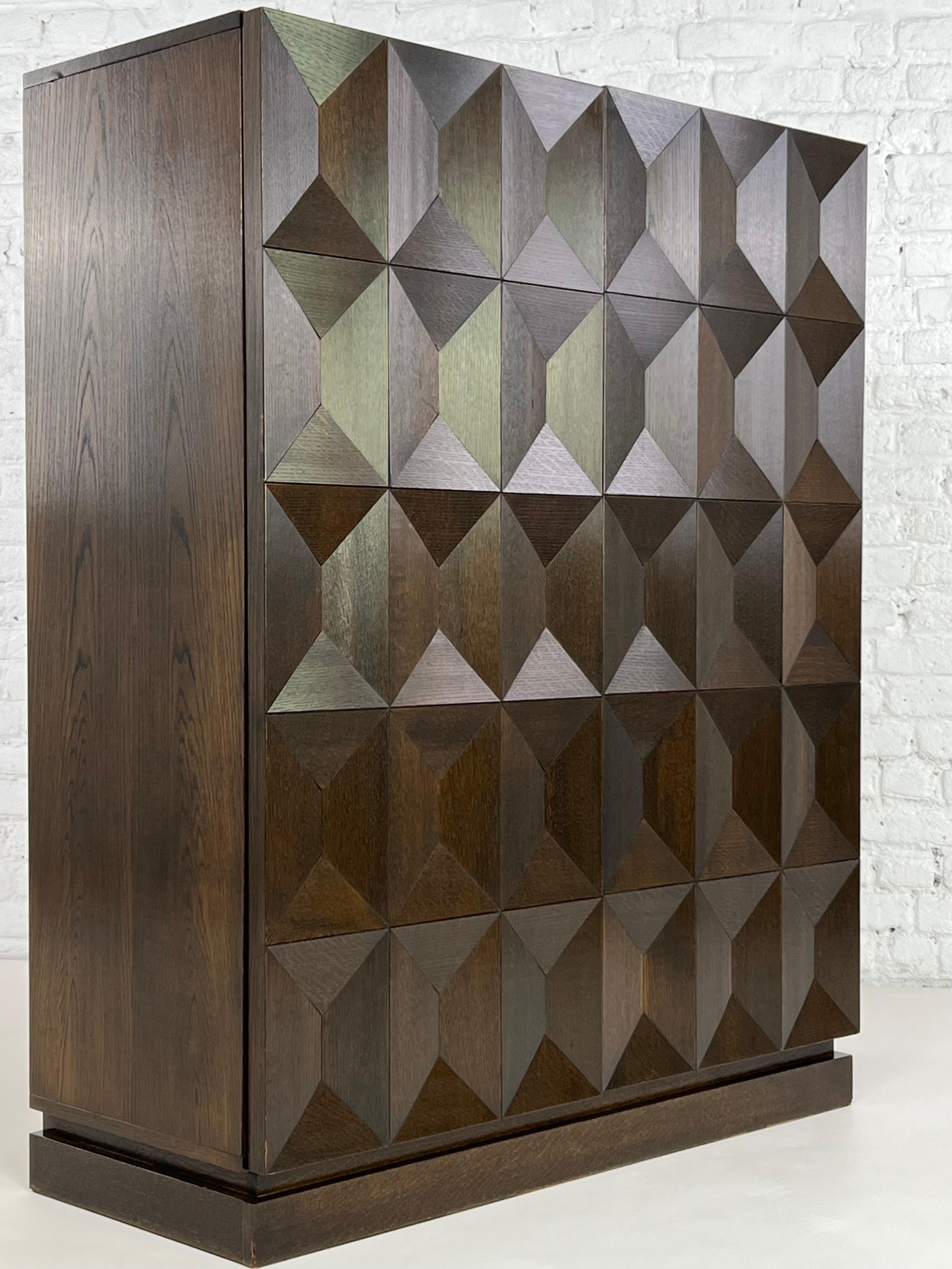 Minimalist And Brutalist Dutch Design buffet with graphic diamond shaped panels doors, geometric and timeless lines, robustness and high quality crafmanship by the De Coene Brothers : can be used as a dry bar or storage cabinet.
 