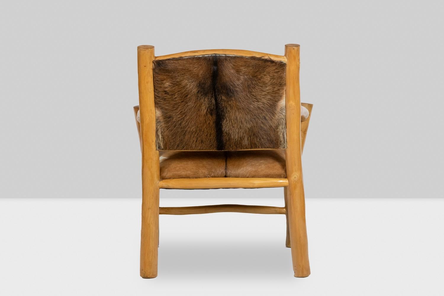 20th Century Brutalist style armchair in elm and goatskin, 1970s For Sale
