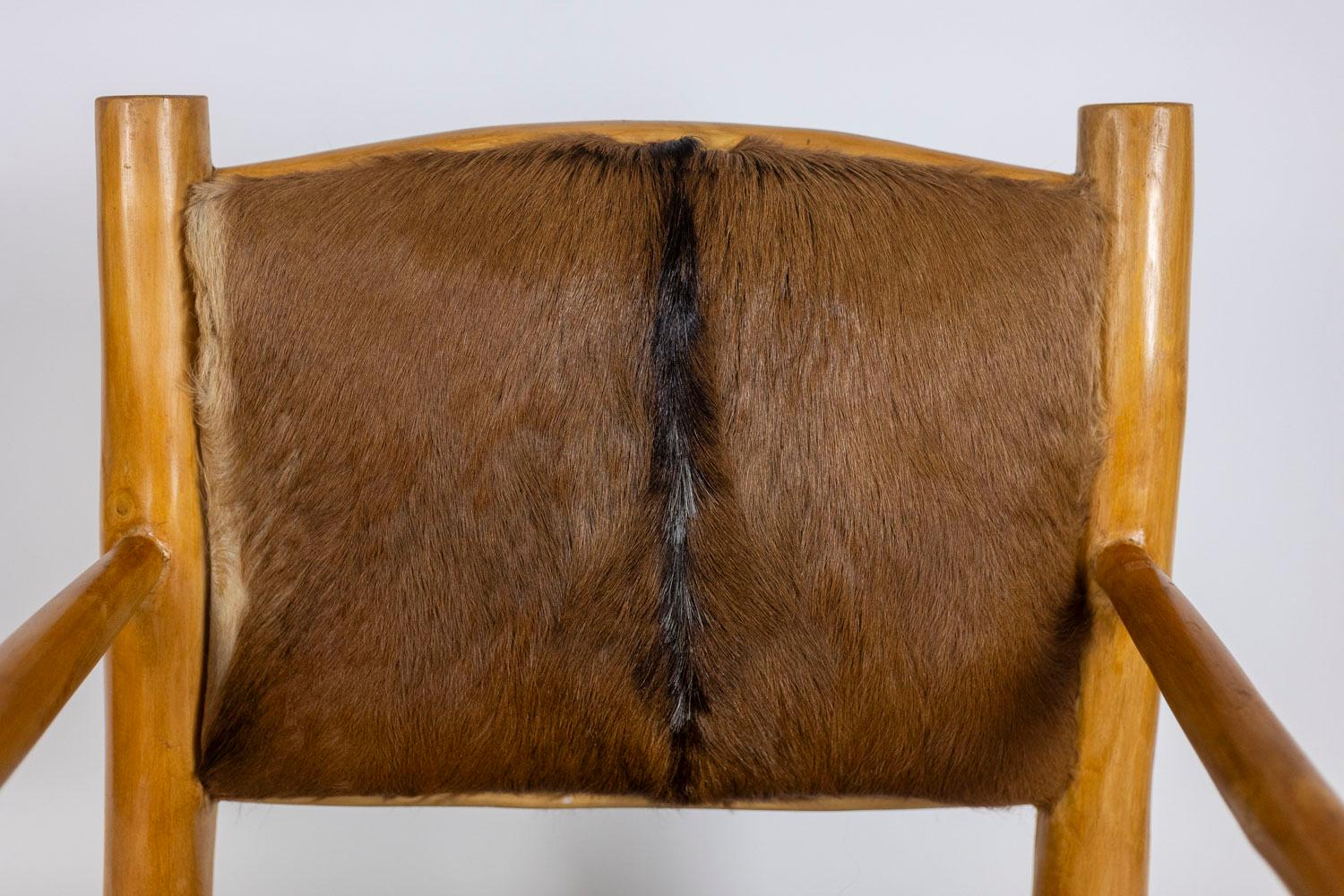 Goatskin Brutalist style armchair in elm and goatskin, 1970s For Sale