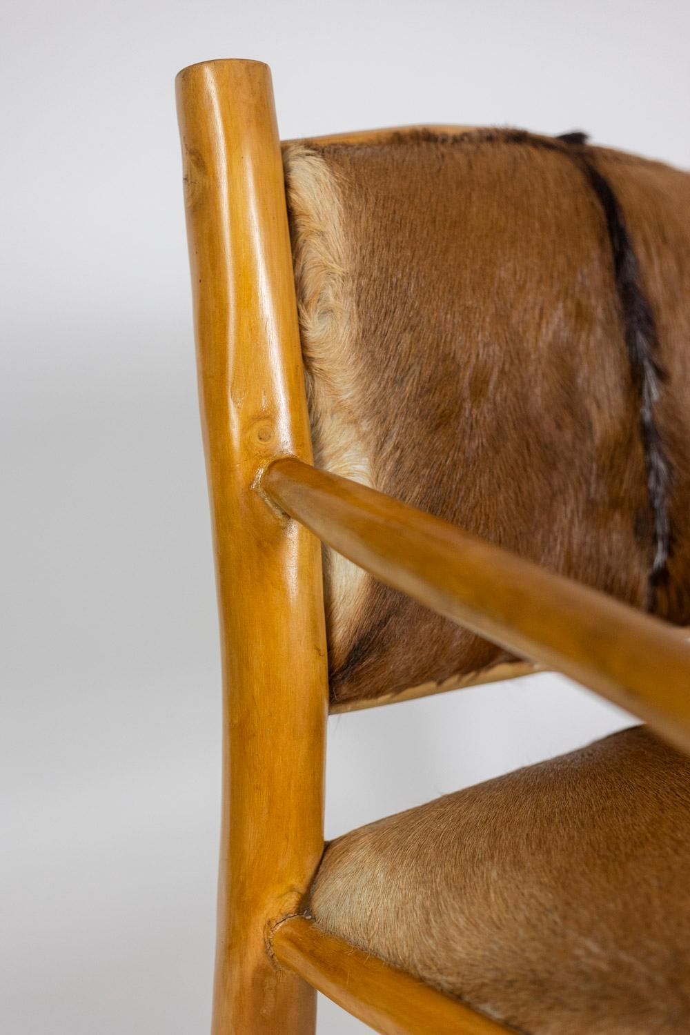 Brutalist style armchair in elm and goatskin, 1970s For Sale 1