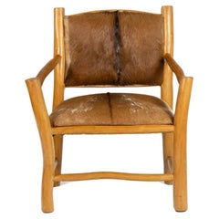 Brutalist style armchair in elm and goatskin, 1970s
