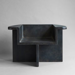 Poltrone in stile brutalista, contemporaneo, colore caffè, fibra di cemento.