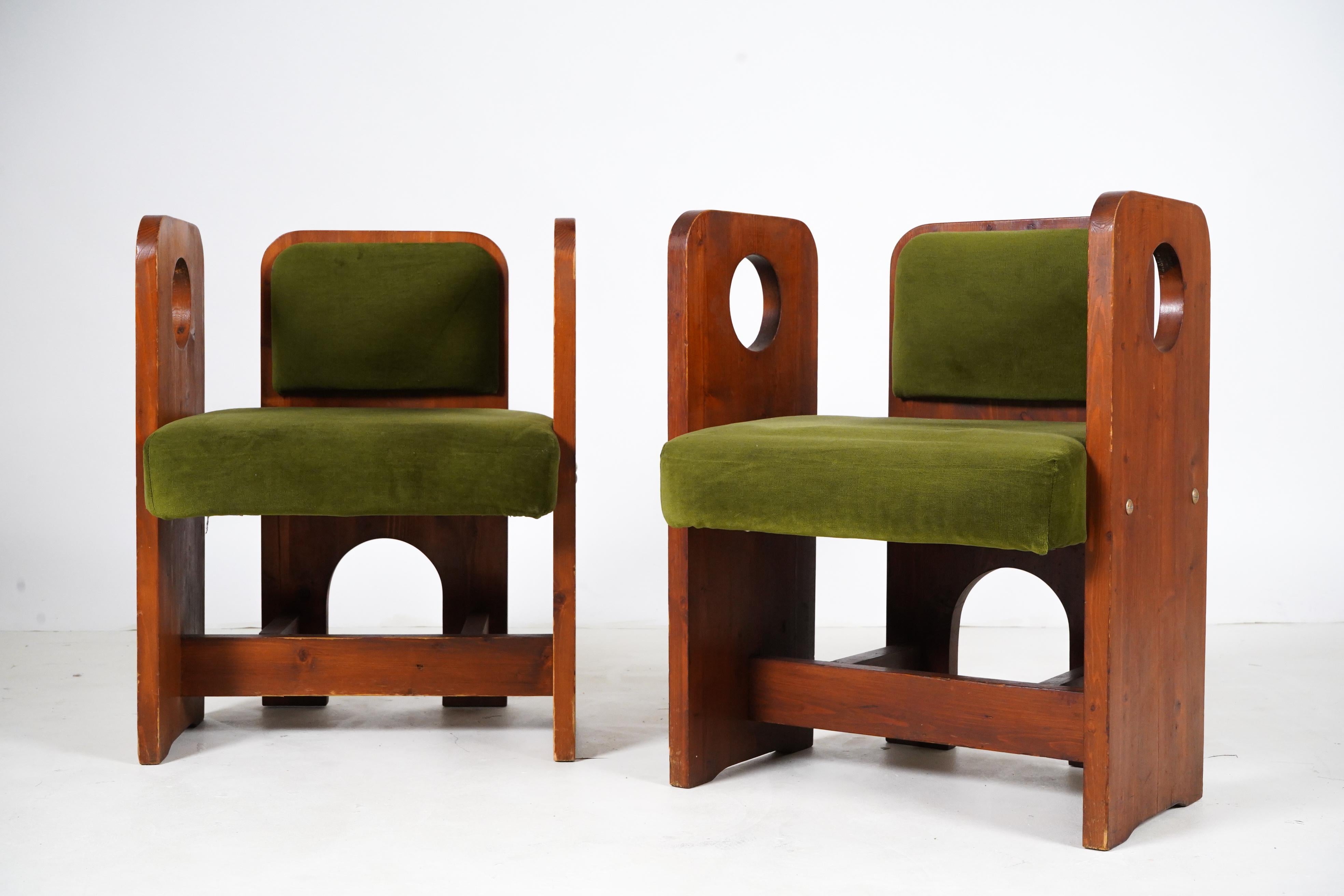 These 1970s-era Brutalist arm chairs were made in Budapest Hungary. During the 1960s and 1970s, Hungarian furniture makers were encouraged to create simple, modern designs that could be mass-produced. They were also intended to compete with Western