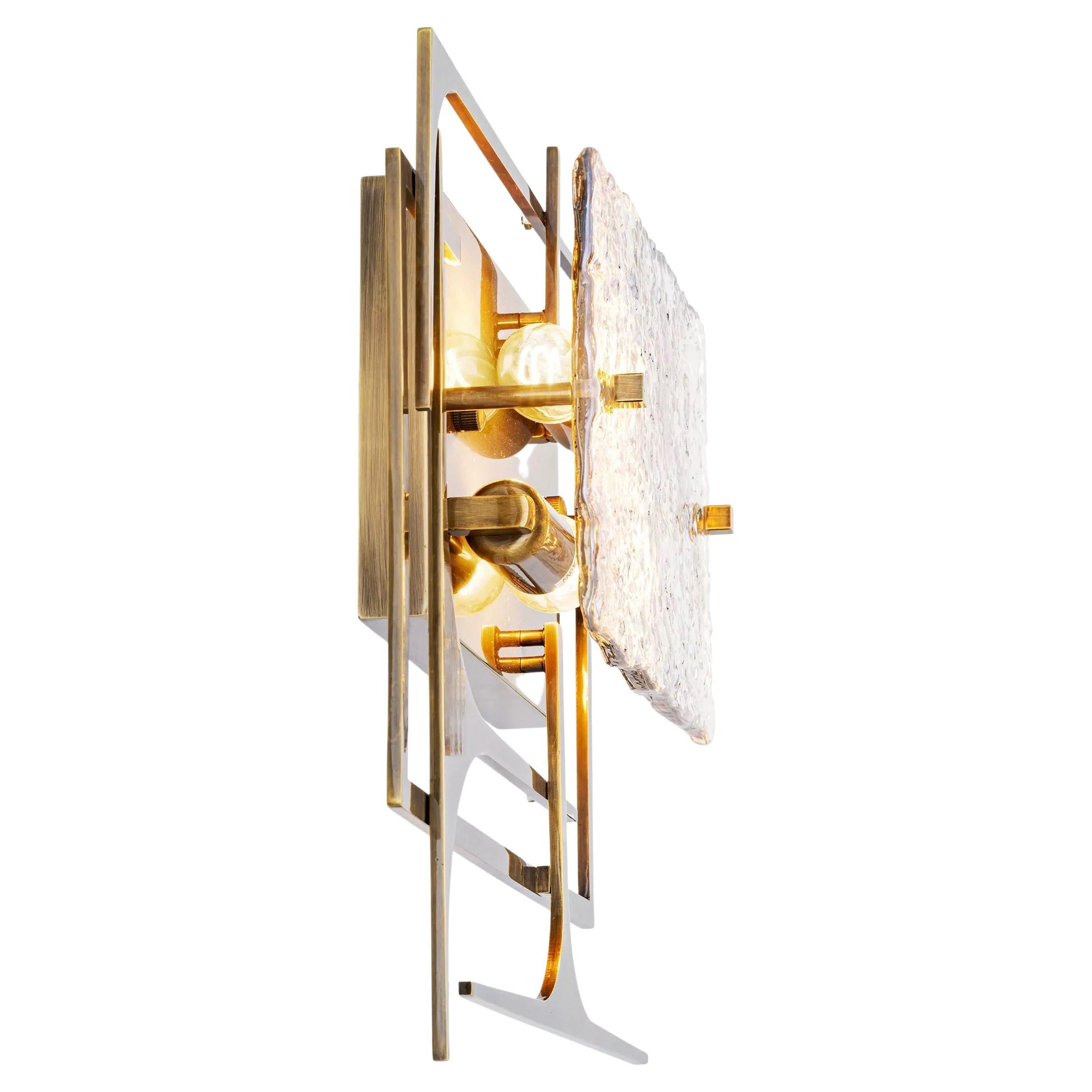 1950s design and Brutalist style wall light composed of a geometric and graphic brass metal base with blown glass. 2 E14 lightbulbs are required.