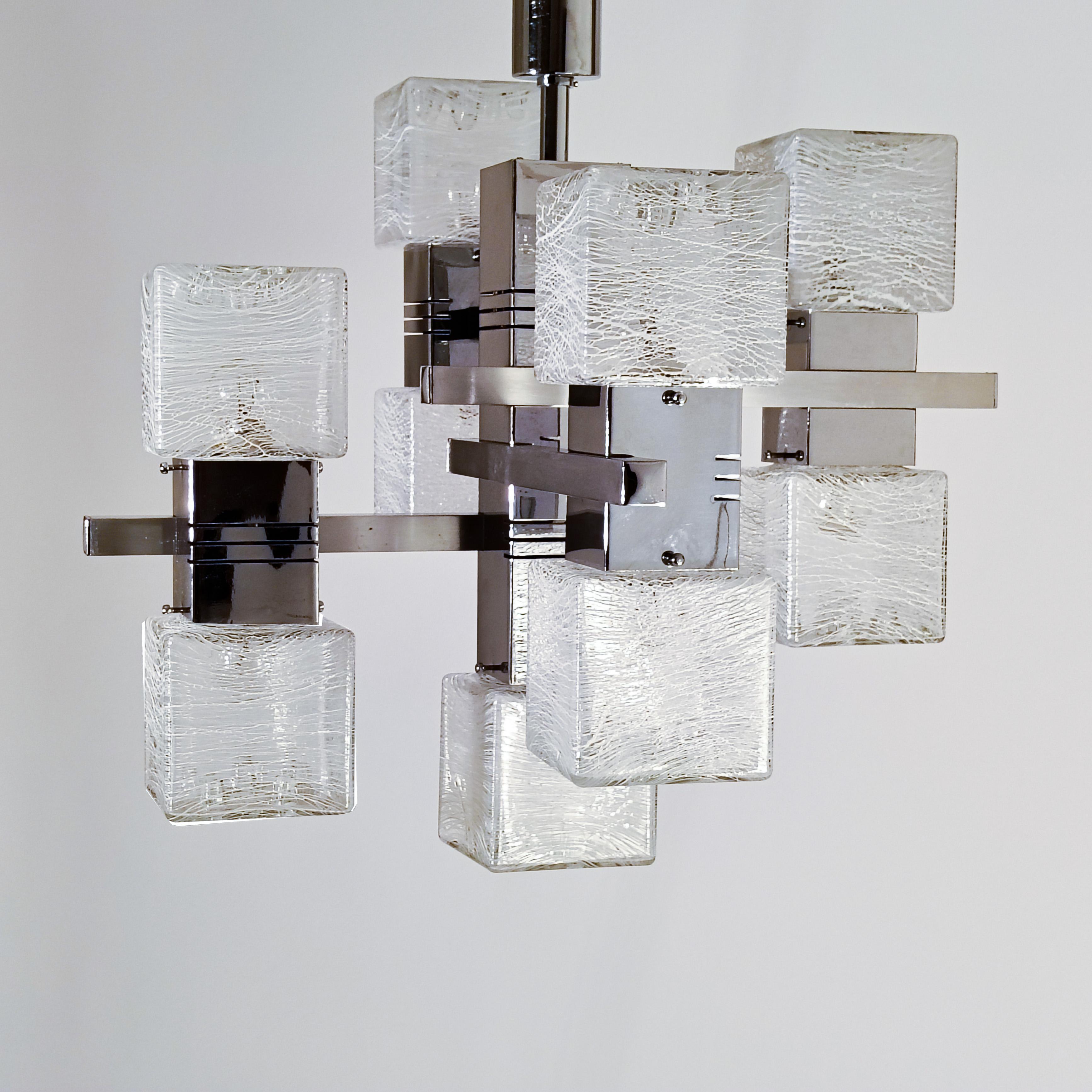Brutalist and Cubist style pendant lamp by Gaetano Sciolari for AV Mazzega, Italy, 1970s. Composed by 9 cubic diffusers of translucent Murano glass combined with white glass using the 