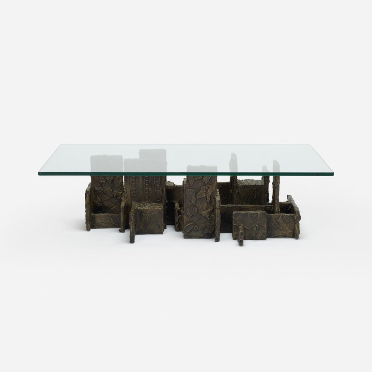 Rare coffee table model PE-131 by renowned furniture designer Paul Evans. This unique 