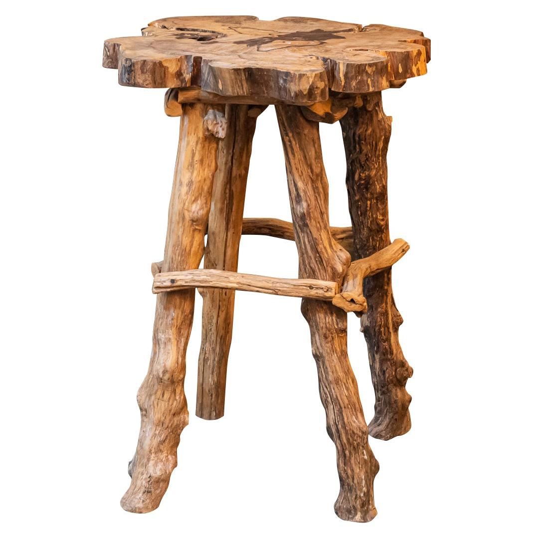 Brutalist style, stand, 
Raw wood, 
Composed of a top with an irregular edge and four legs,
circa 1920, France. 

Measures: Height 107 cm, diameter 88 cm.

The lines of this stand are inspired by brutalist design. It was made entirely by hand which