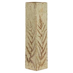 Brutalist-style stoneware vase with plant decoration. 1970s.