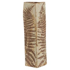 Brutalist-style stoneware vase with plant decoration. 1970s.