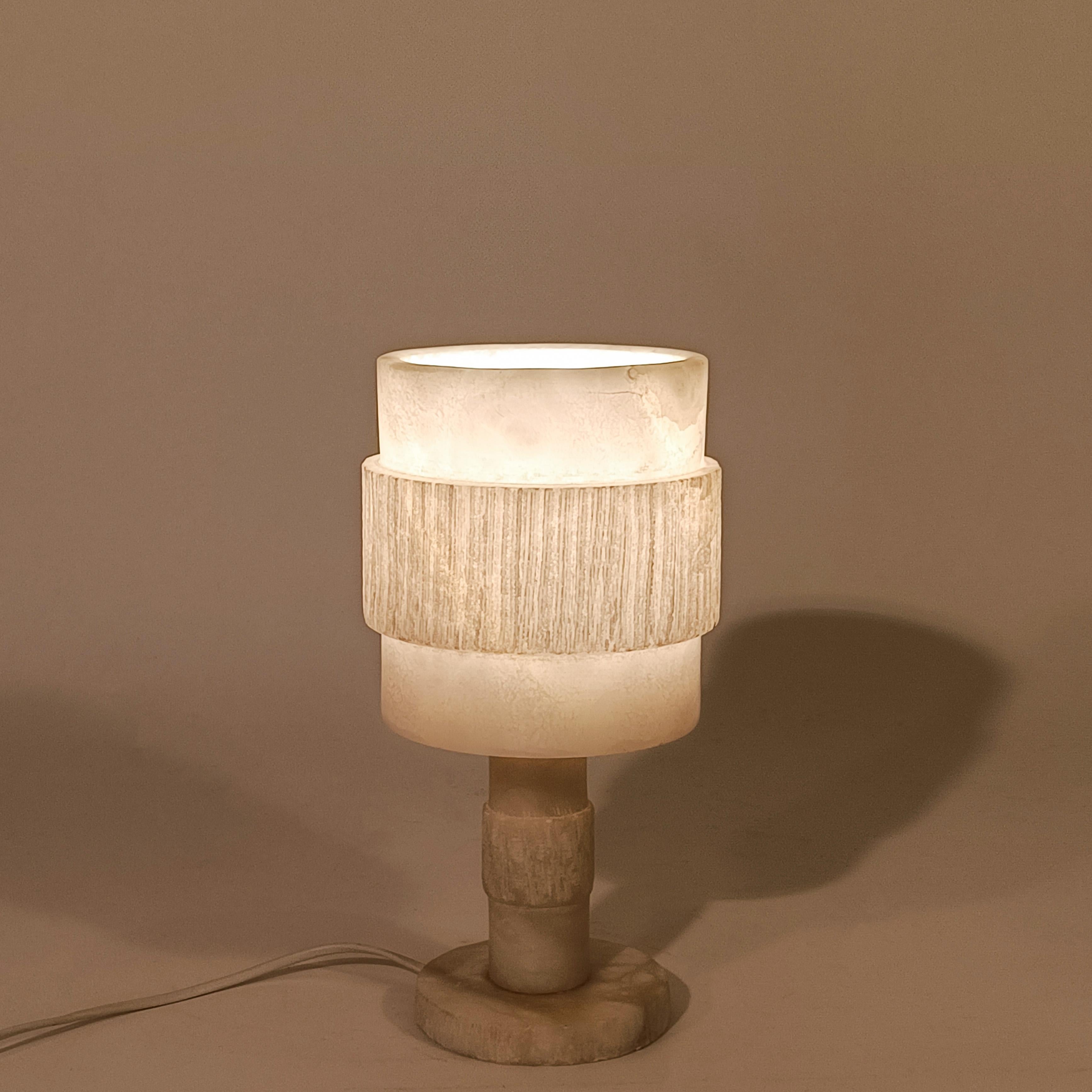 Hand-Carved Brutalist style. Turned veined alabaster table lamp, Spain, 1950s For Sale