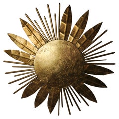 Brutalist sun floral wall lamp, gold leaf gilded metal, Italy, 1970