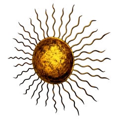 Brutalist sun wall light in gold leaf gilded metal, Italy, 1970