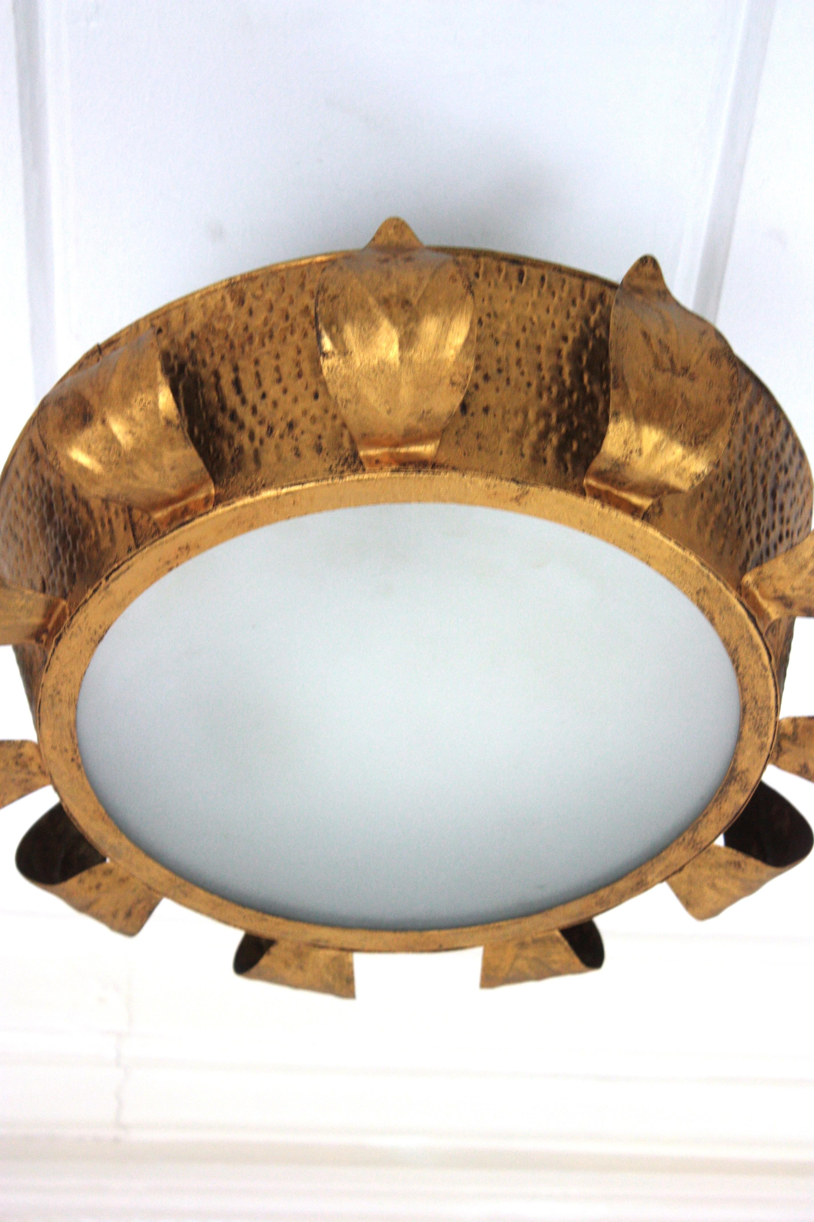 Hammered Brutalist Sunburst Crown Ceiling Flush Mount Light Fixture in Gilt Iron, 1950s For Sale