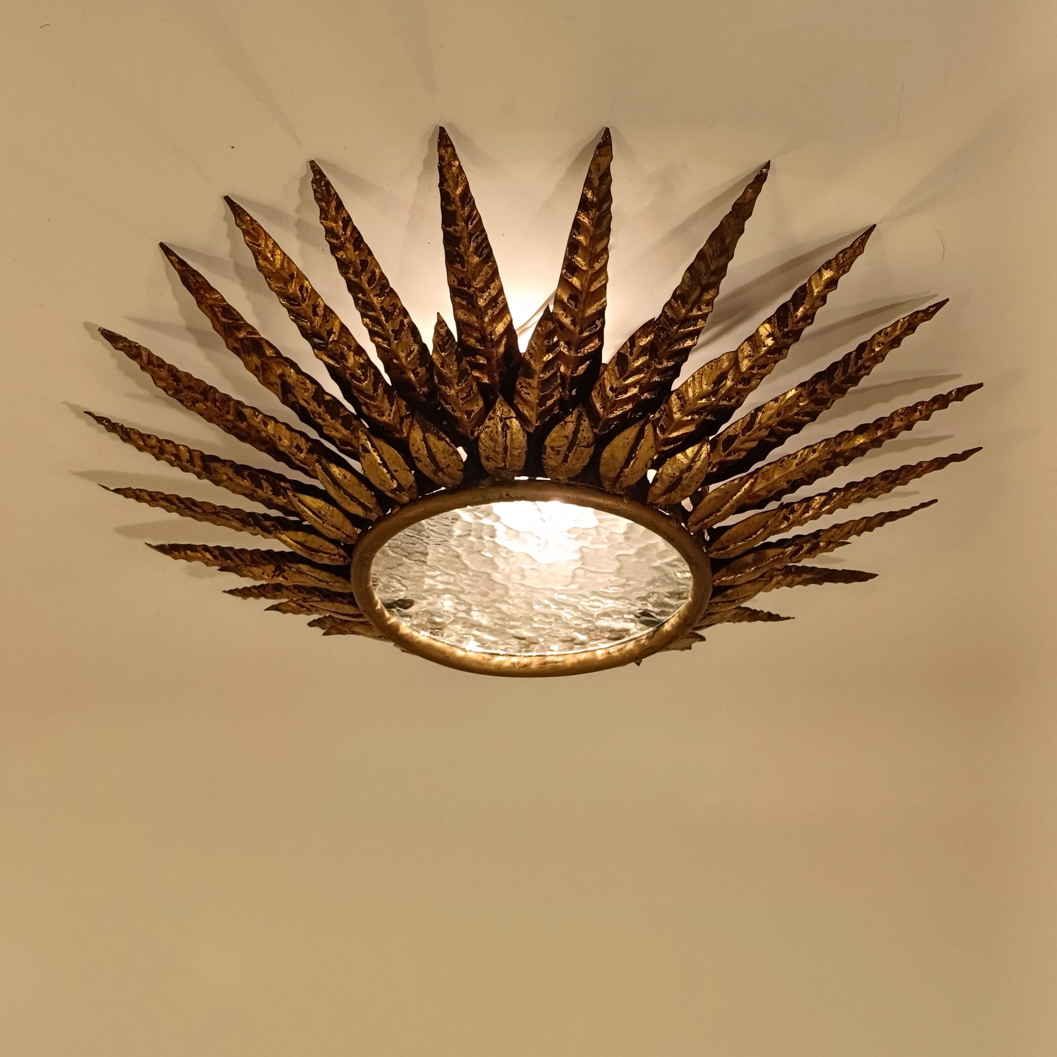 Brutalist Sunburst flush mount by Ferro Art, Spain, 1960s In condizioni buone in vendita a SANT ADRIÀ DE BESÒS, ES