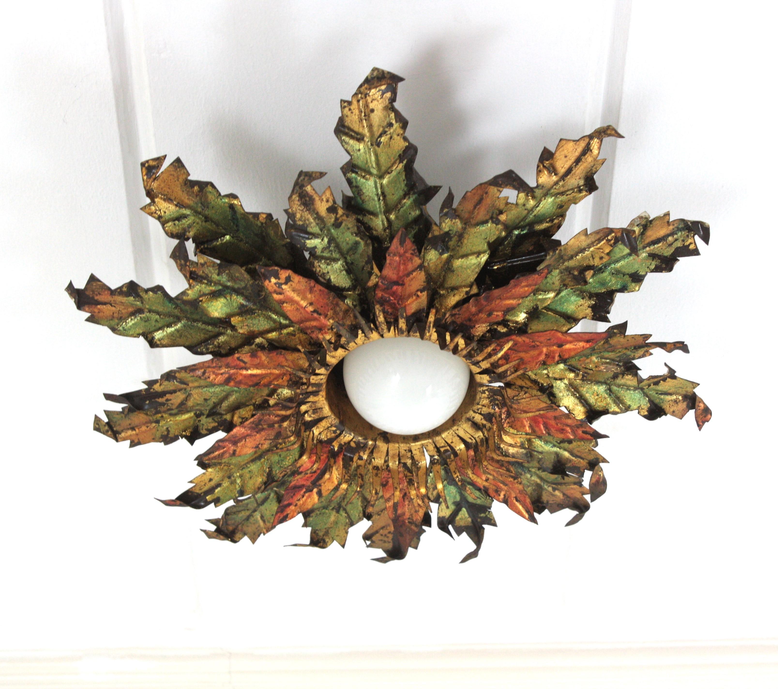 20th Century Brutalist Sunburst Foliage Light Fixture in Gilt Iron with Green & Red Accents For Sale