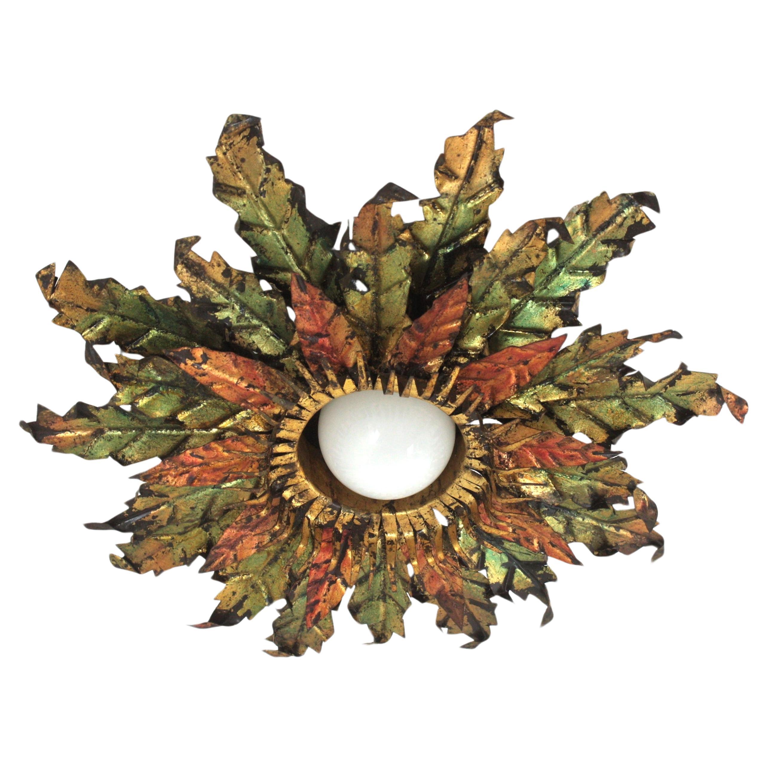 Brutalist Sunburst Foliage Light Fixture in Gilt Iron with Green & Red Accents For Sale