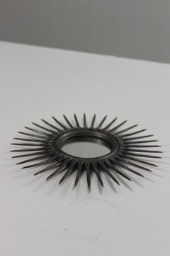 Brutalist sunburst mirror in wrought iron, France 1950s