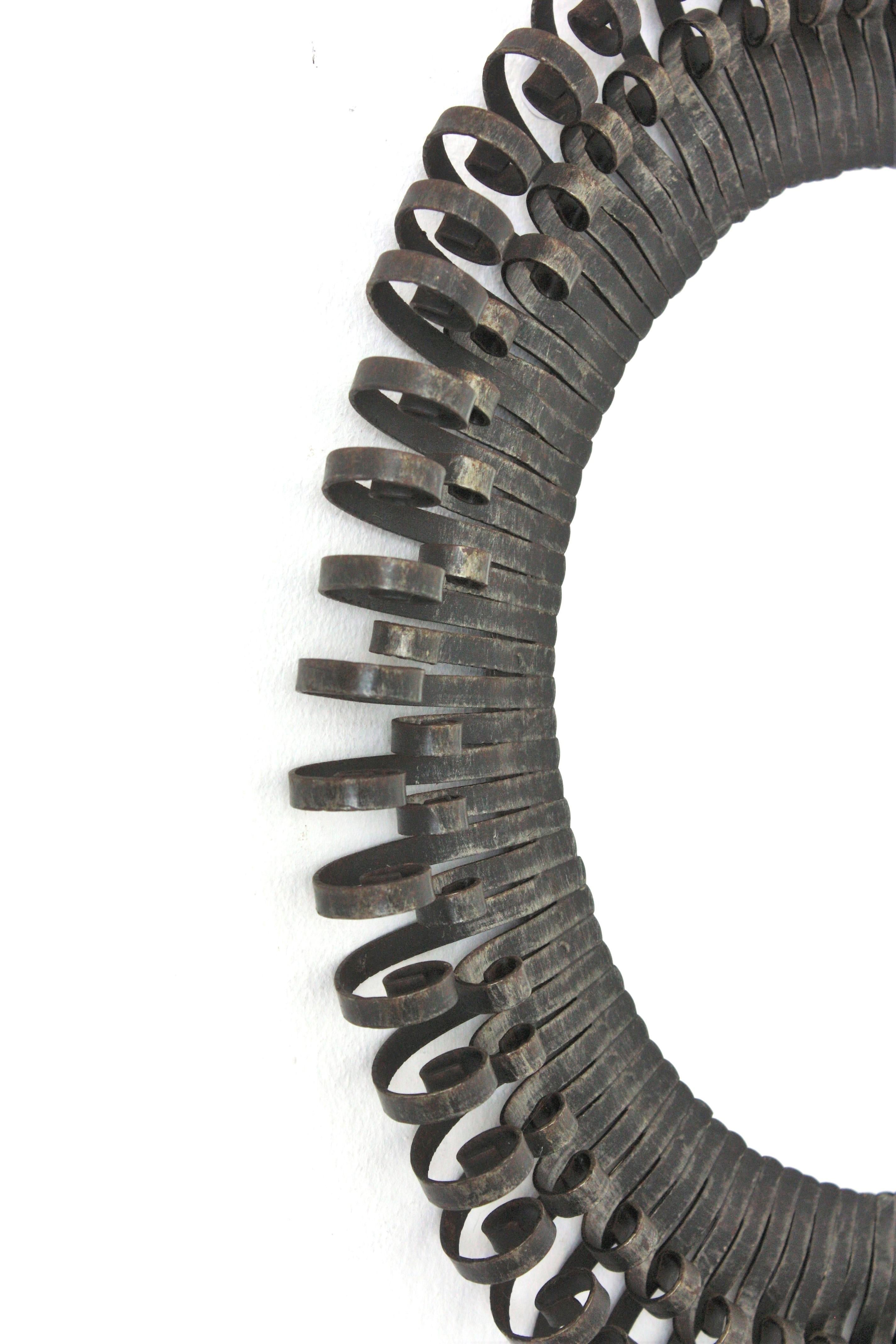 Brutalist Sunburst Mirror with Scroll Endings, Wrought Iron, 1950s Brutalista en venta
