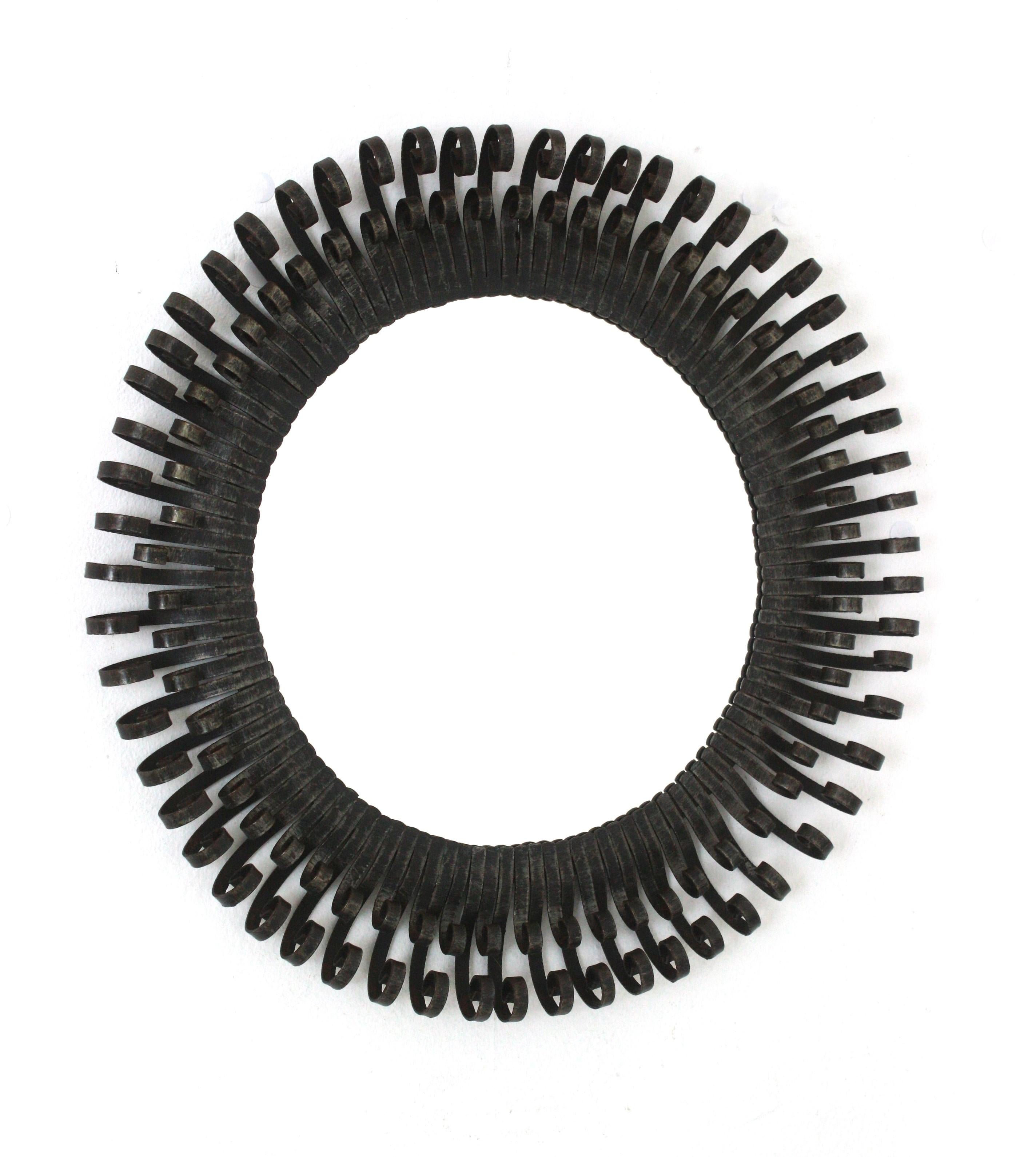 Brutalist Sunburst Mirror with Scroll Endings, Wrought Iron, 1950s Español en venta