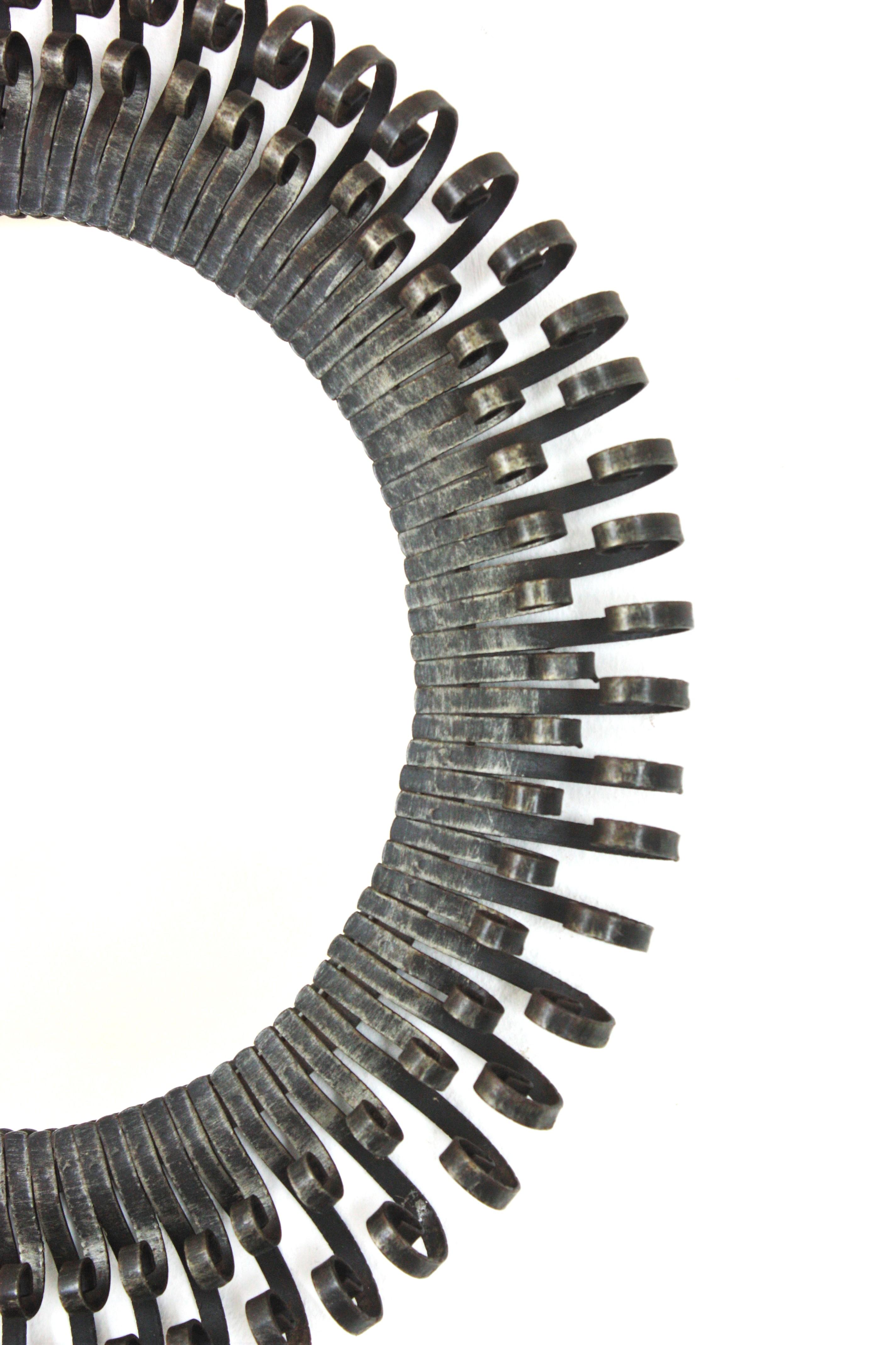 Brutalist Sunburst Mirror with Scroll Endings, Wrought Iron, 1950s Metal en venta