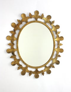 Miroir ovale brutal en fer forgé doré, années 1950