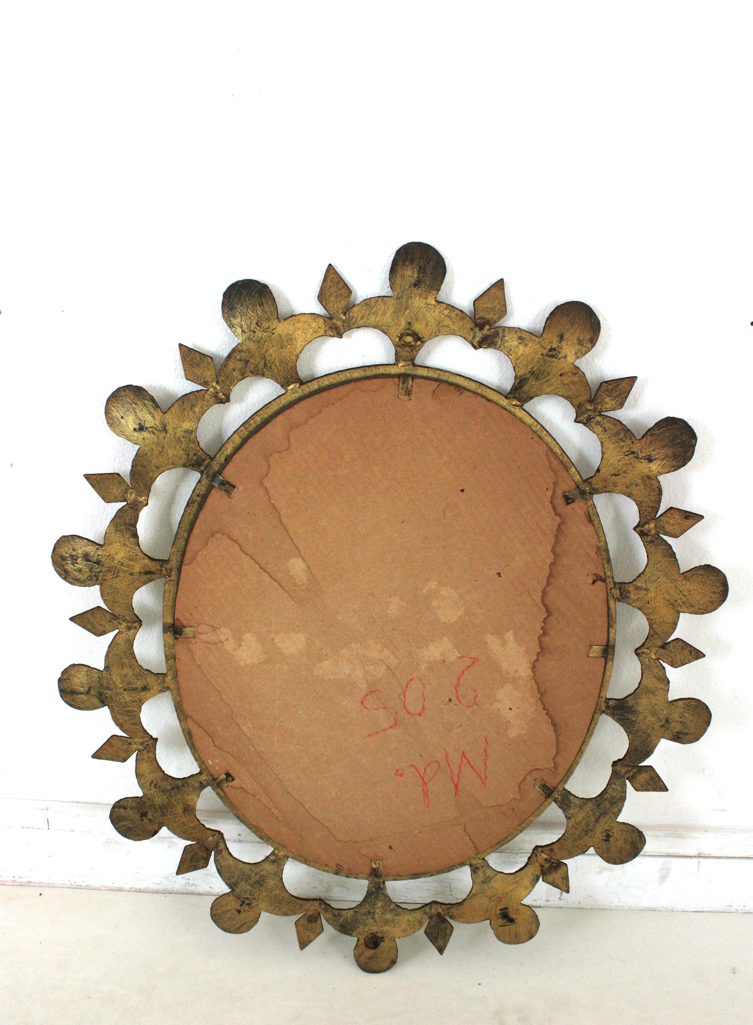 Brutalist Sunburst Oval Mirror in Gilt Wrought Iron 3