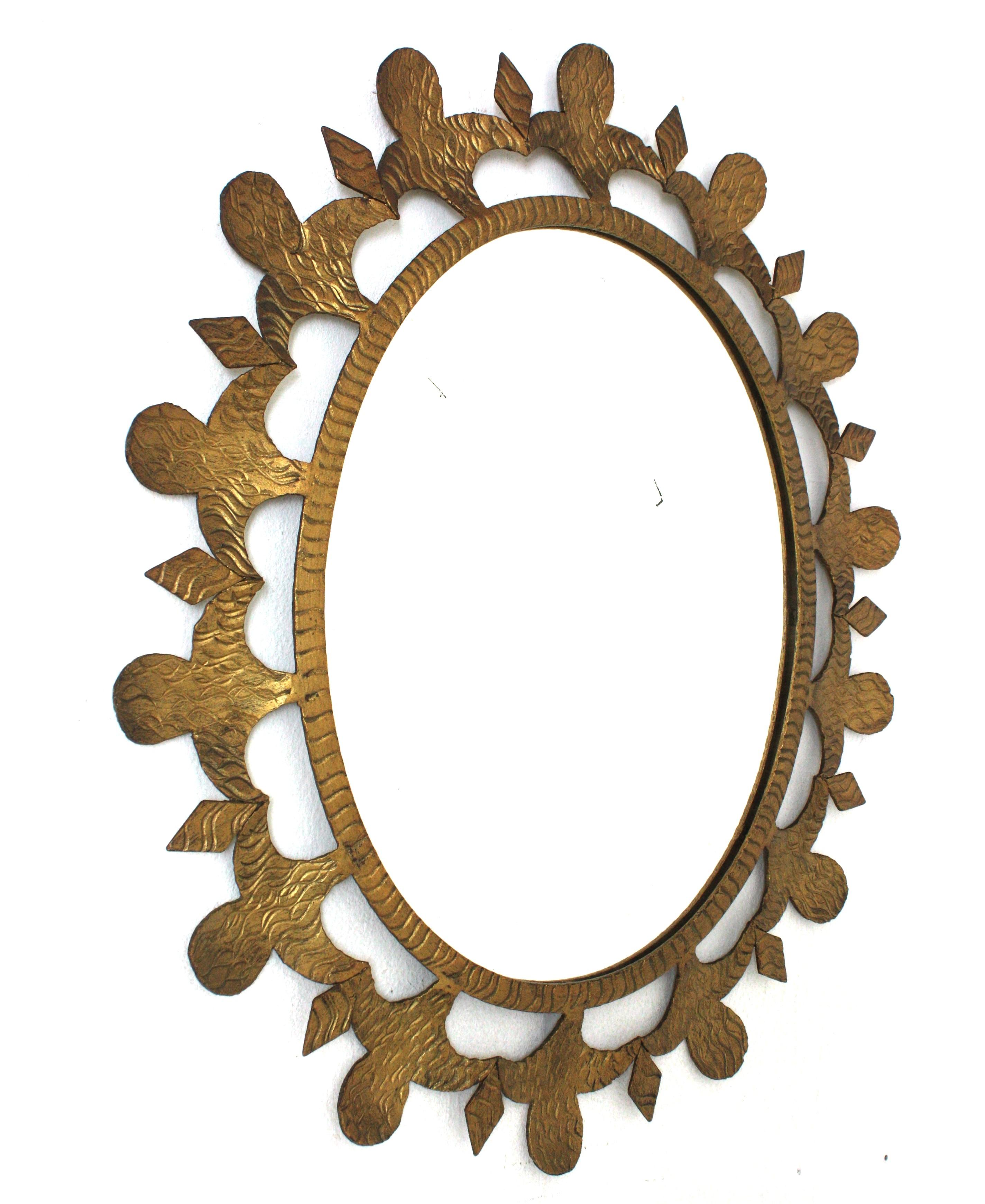 French Brutalist Sunburst Oval Mirror in Gilt Wrought Iron