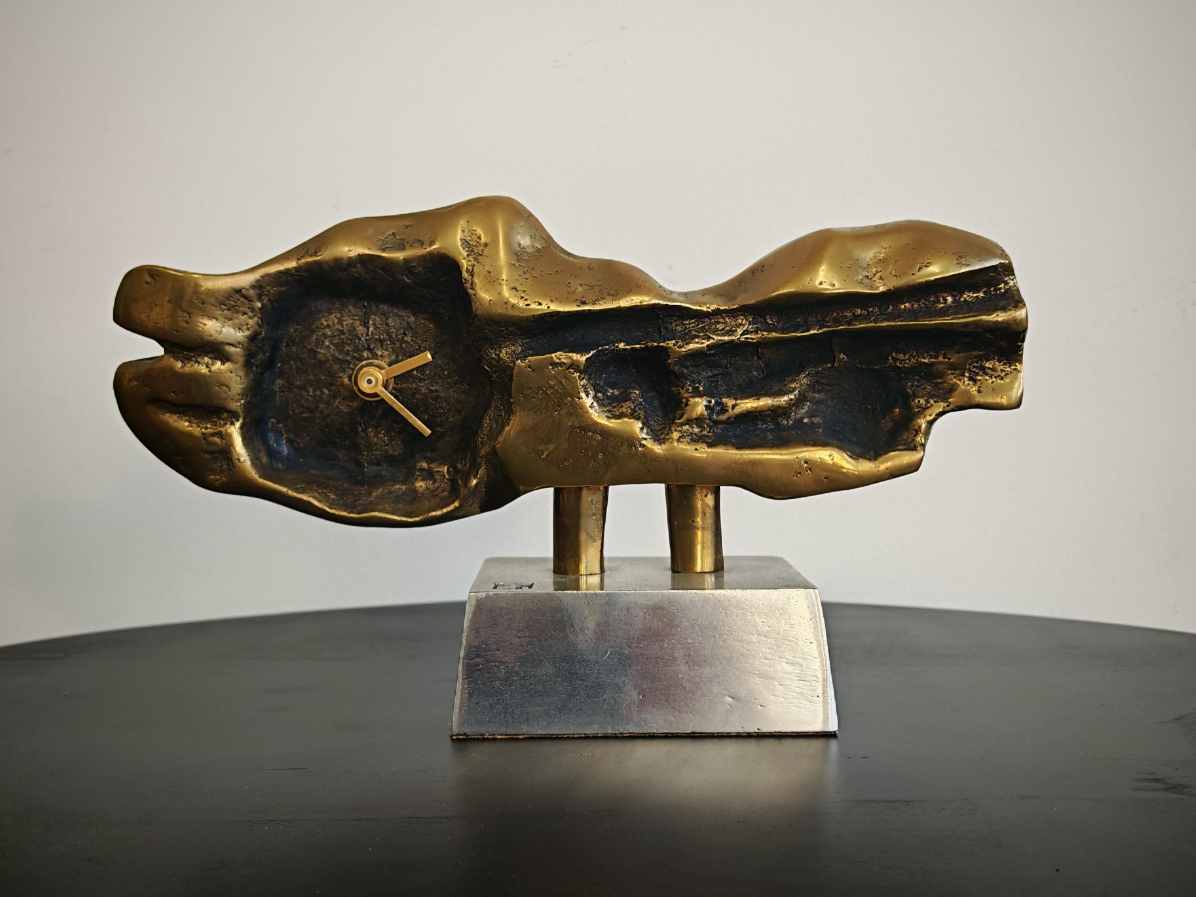 In this listing you will find a breathtaking Brutalist Table Clock. Designed by a Scottish designer David Marshall, who moved to Spain and designed a variety if decorative objects. He found inspiration in work of Salvador Dali and this particular