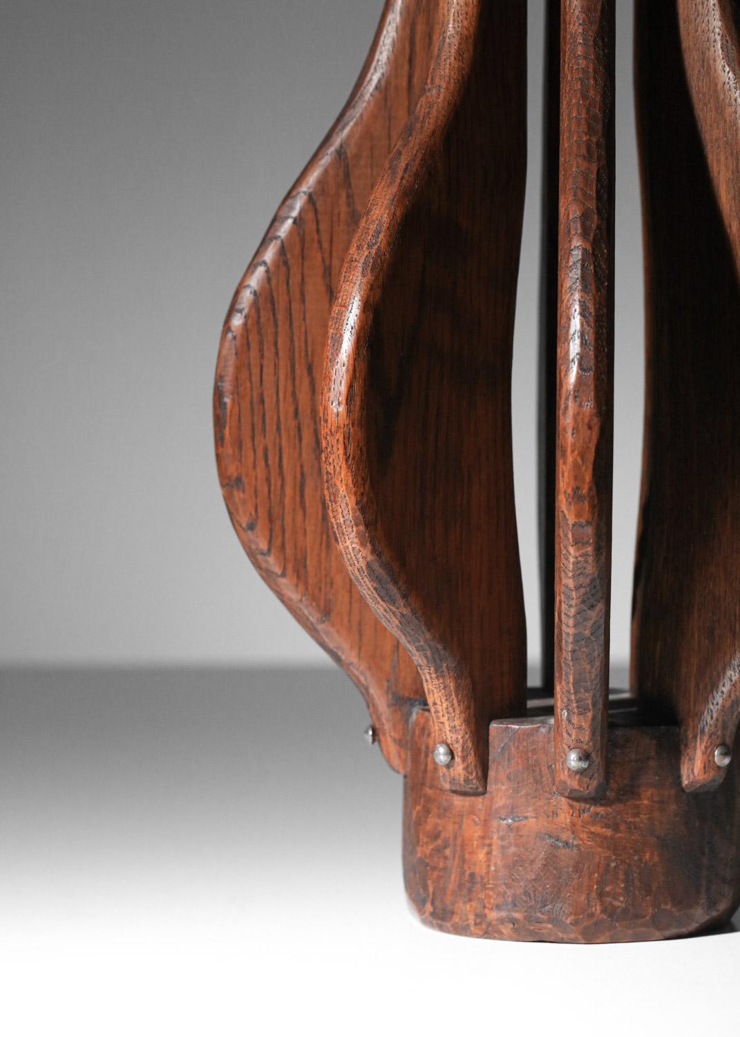 Brutalist-style table lamp, folk art work from the 60s. Openwork base in hand-stained solid oak. Beautiful vintage condition, with a beautiful patina of age on the wood and metal fasteners (see photos). Presentation shade sold on request.