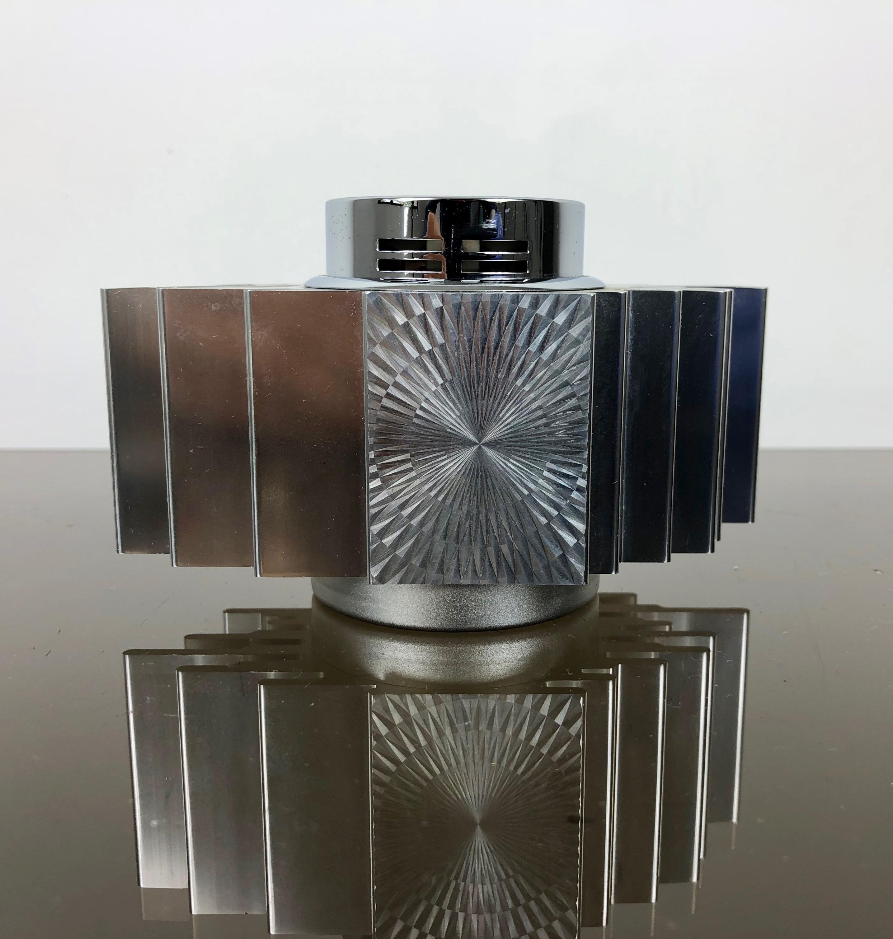 Brutalist table lighter from Japan, bizarre design from the 1960s. Housing Aluminum.
Marked underneath with Sarome Piezo Electric table butane gas lighter.
 