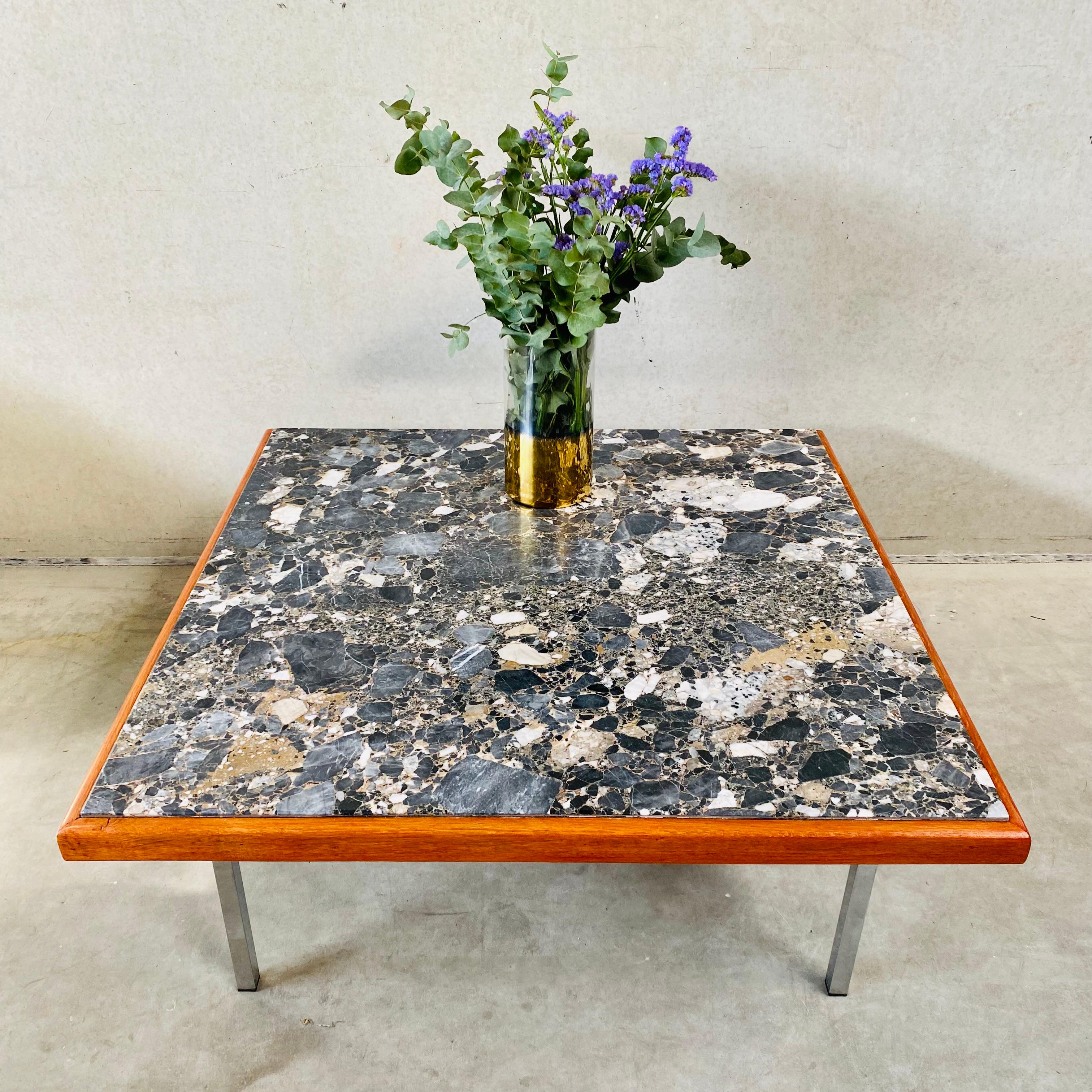 Elegant Vintage Brutalist Granito Terrazzo Coffee Table with Teak Frame

Discover a true masterpiece of design with our vintage brutalist granito terrazzo coffee table, reminiscent of Erling Viksjø's celebrated 1970 style. Crafted with meticulous