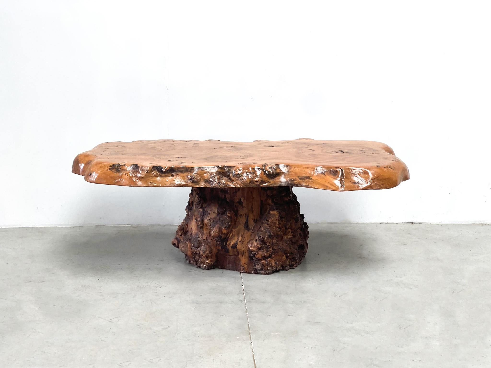 Design in its purest form. A brutalist oak coffee table made in the 80s. The wood has acquired a very nice patina over the years. These tables are becoming more sought afhter over the years. It is made out of a oak tree!