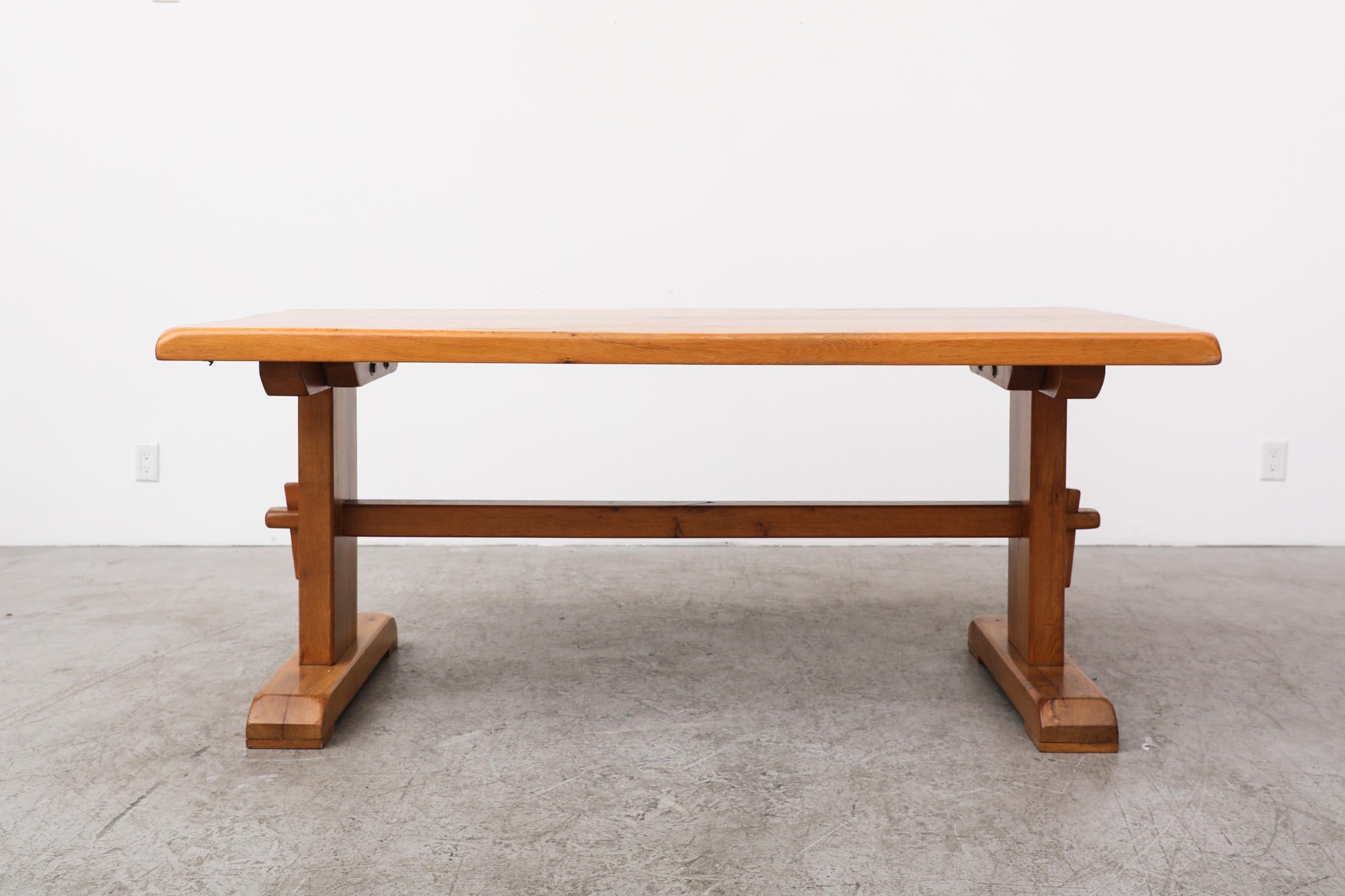 Brutalist solid elm dining table with trestle base by Belgian manufacturer 