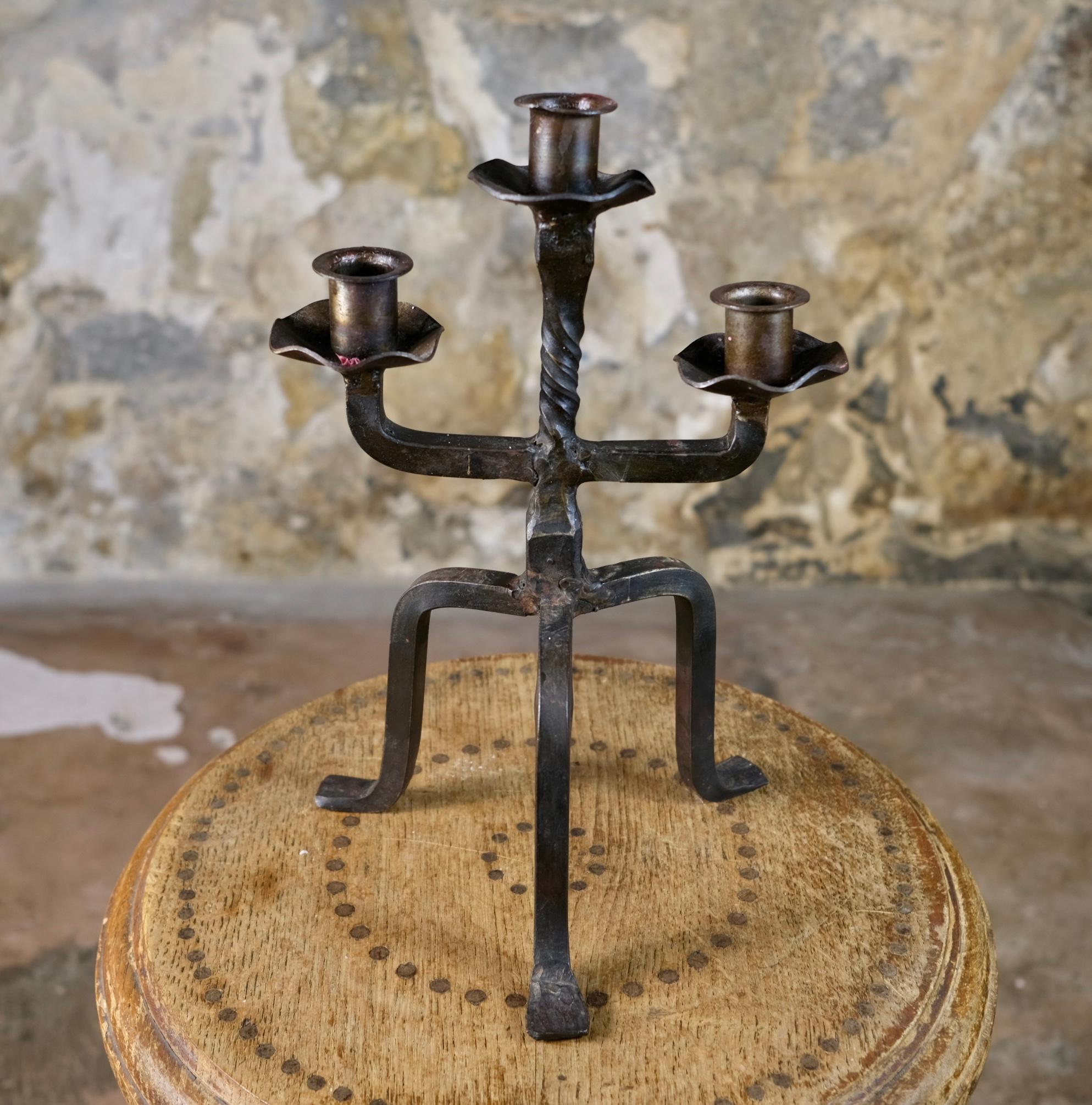 Brutalist tripod candlestick in wrought iron, France, 1950s 4