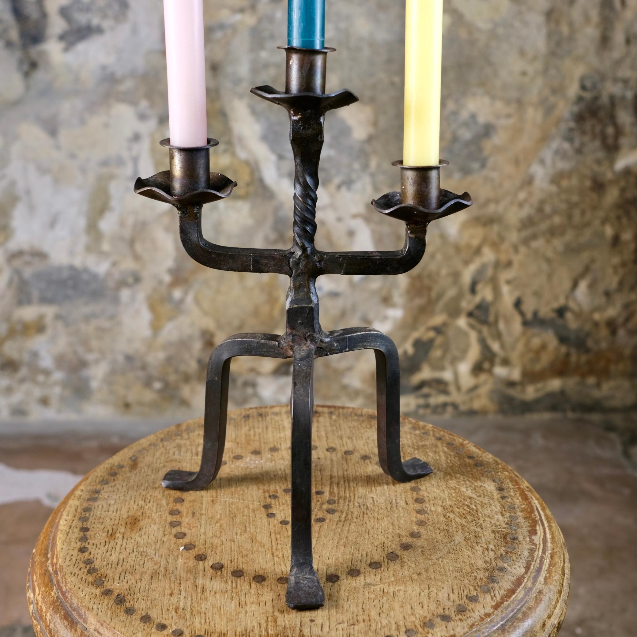 French Brutalist tripod candlestick in wrought iron, France, 1950s