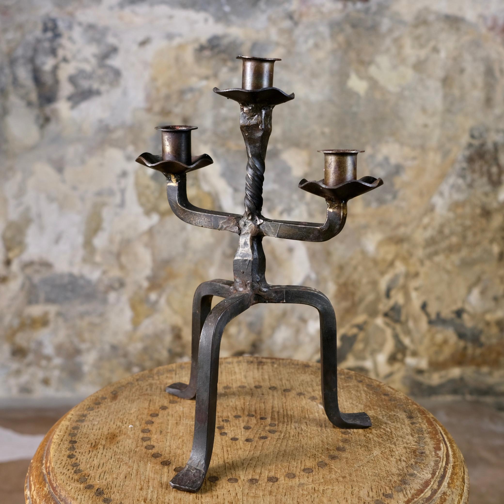 Brutalist tripod candlestick in wrought iron, France, 1950s 2