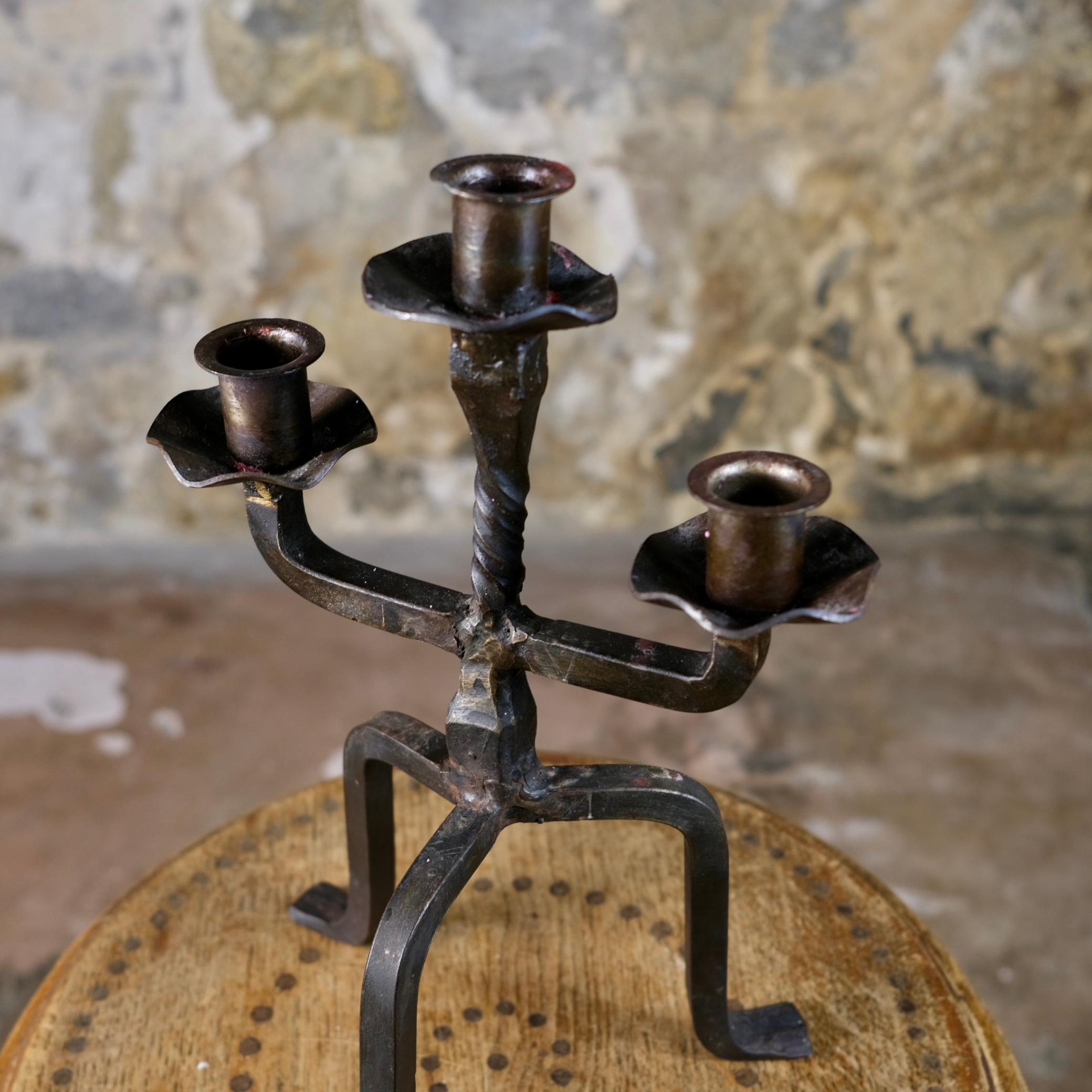 Brutalist tripod candlestick in wrought iron, France, 1950s 3