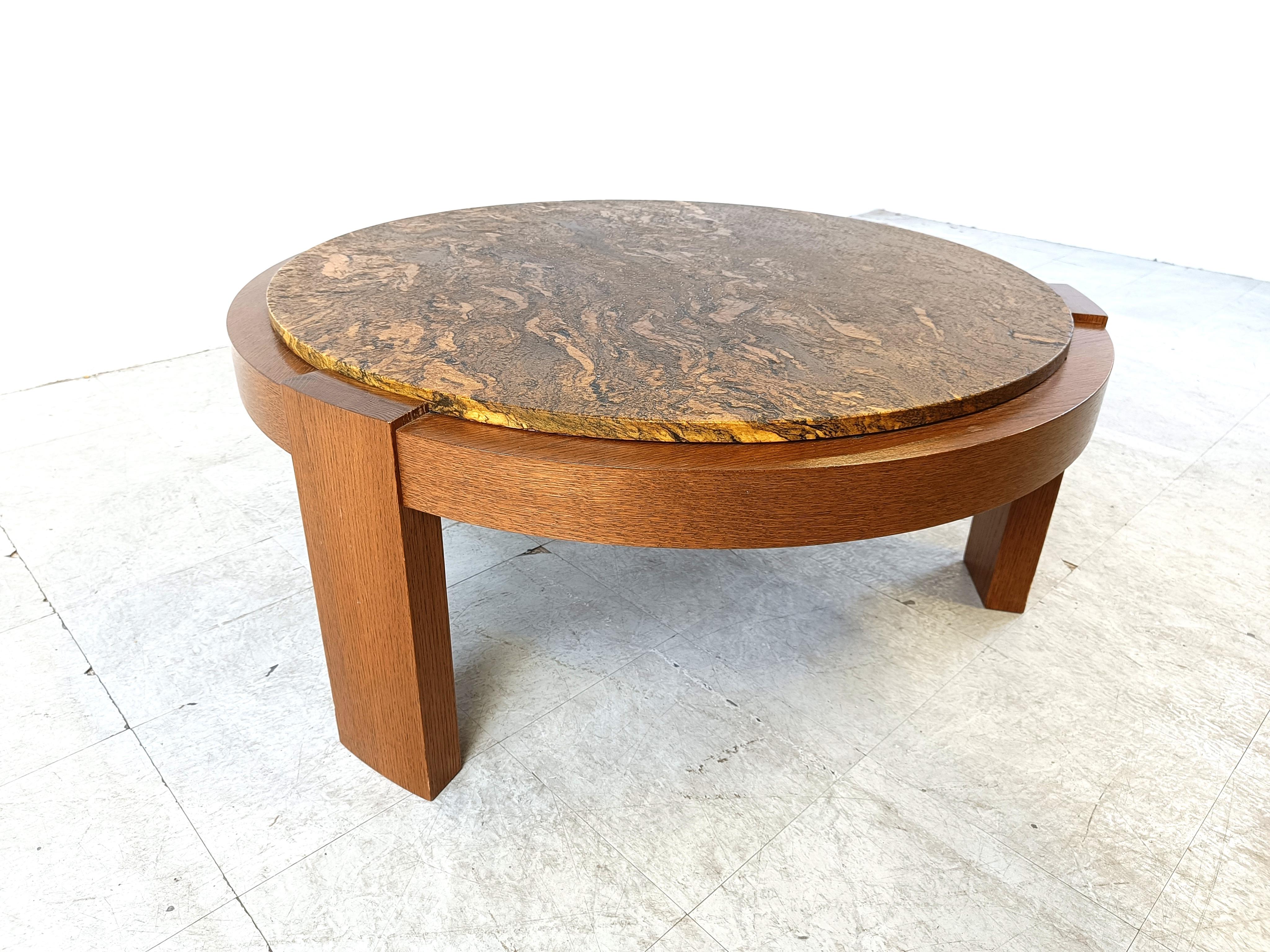 Stone Brutalist tripod coffee table, 1970s For Sale