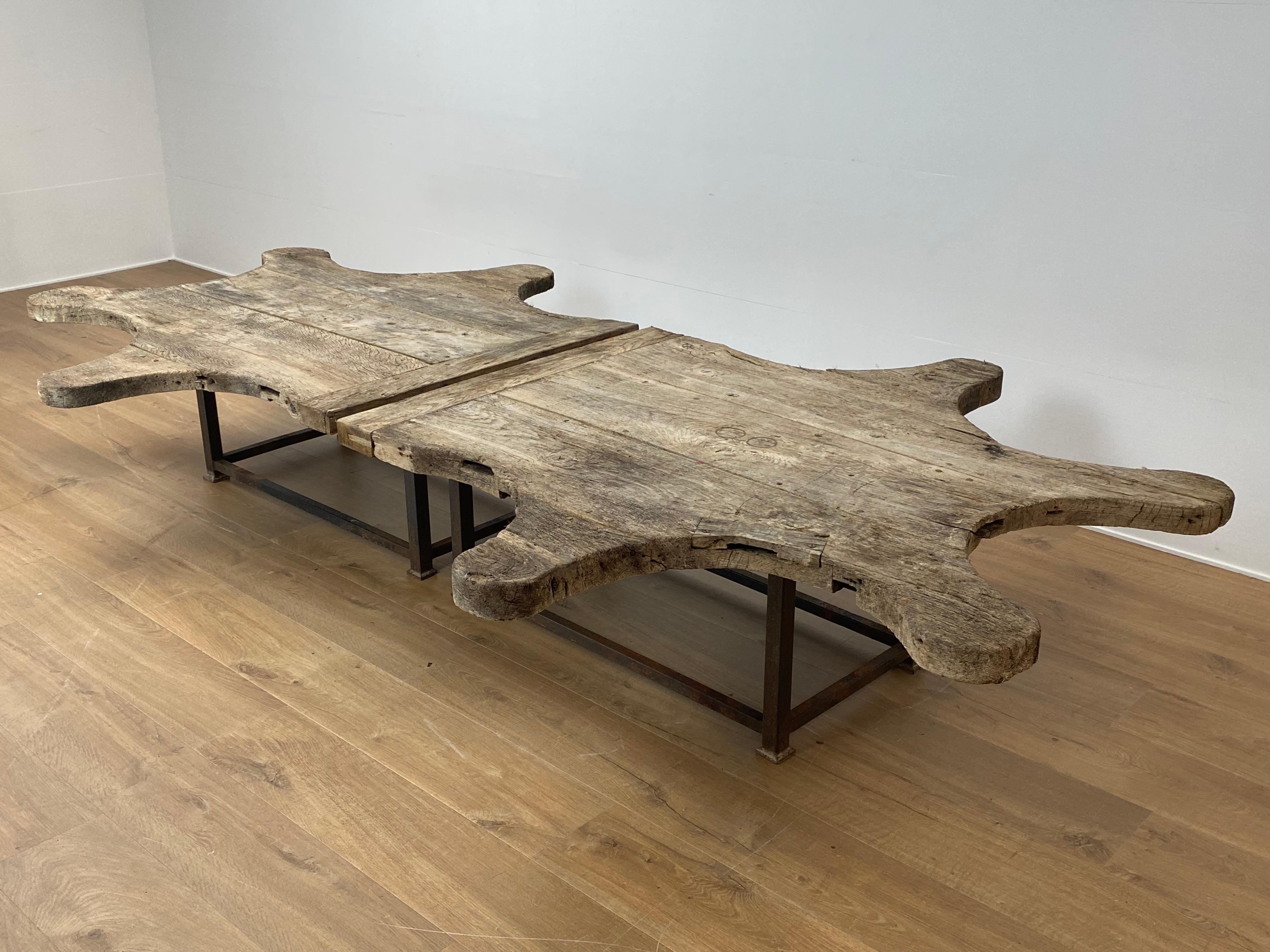 Exceptional Industrial, Brutalist Sofa Table from France, from 1930,
made of 2 Industrial Working Tables from A Jewelry Factory,
based on a brutalist Iron Base,
the Oak wood has a superbe old patina and shine and shows signs of use
and wear,
very