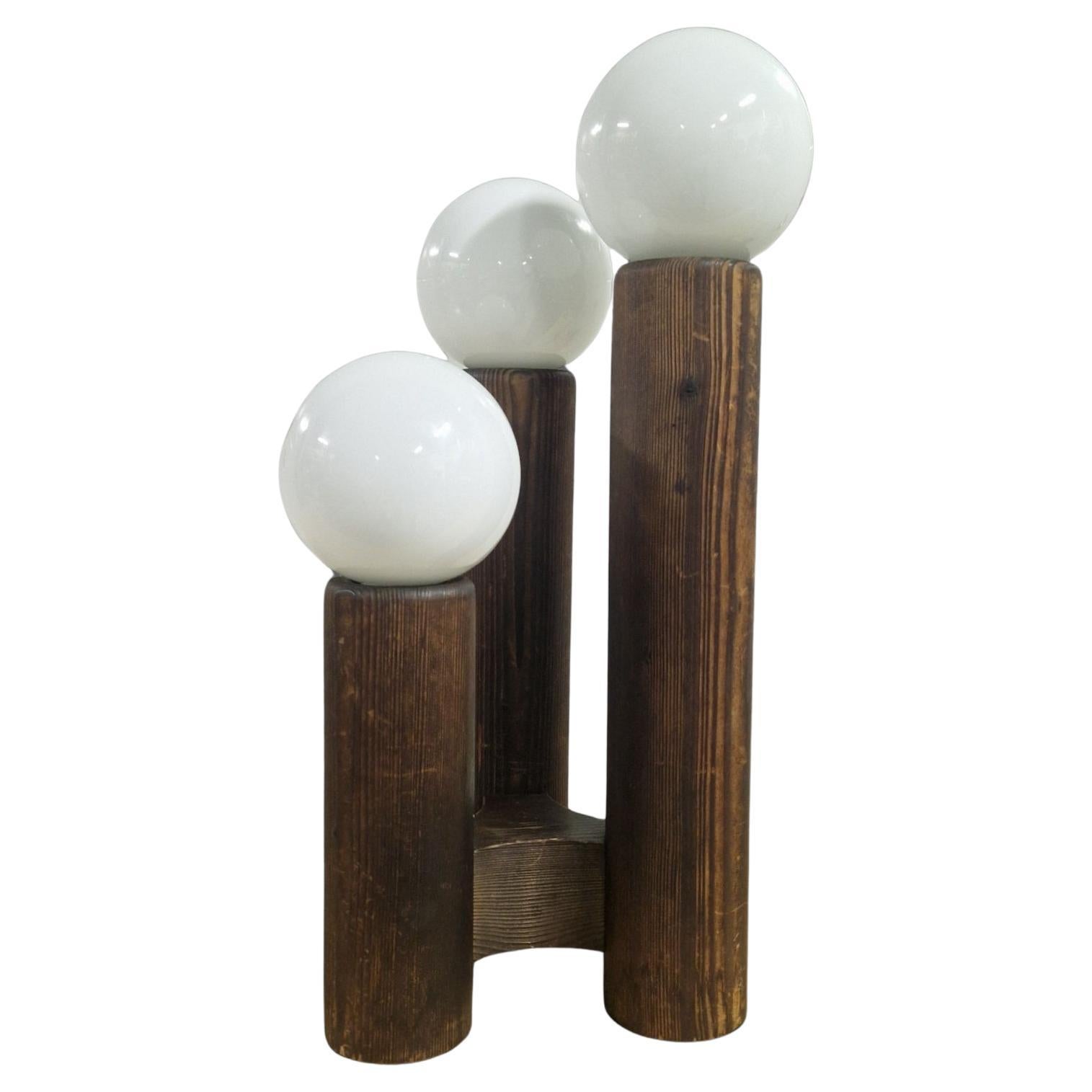 Brutalist wabi sabi table lamp in solid pine by Temde, Switzerland 1970s